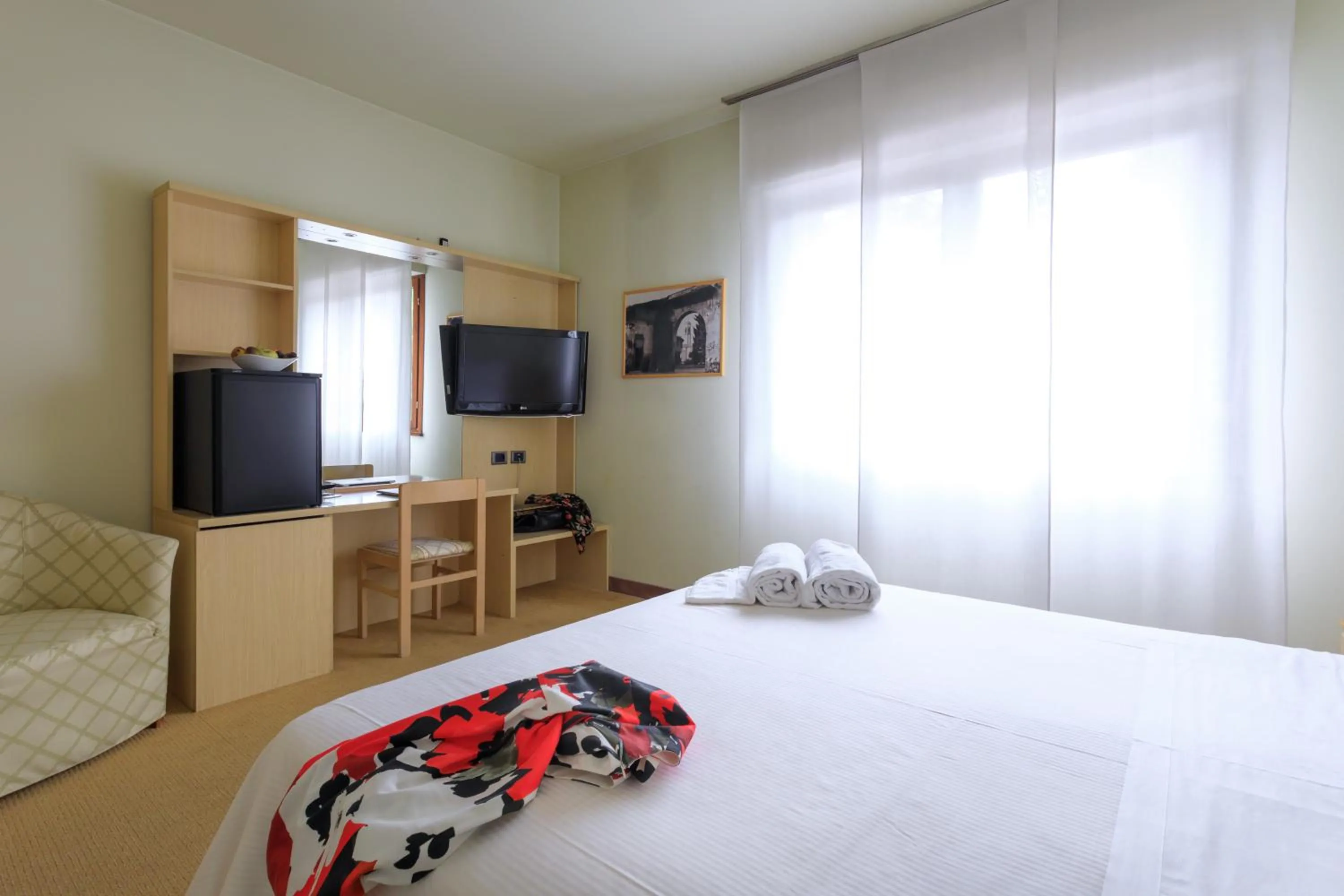 Bed in Brianteo Hotel Residence and Restaurant