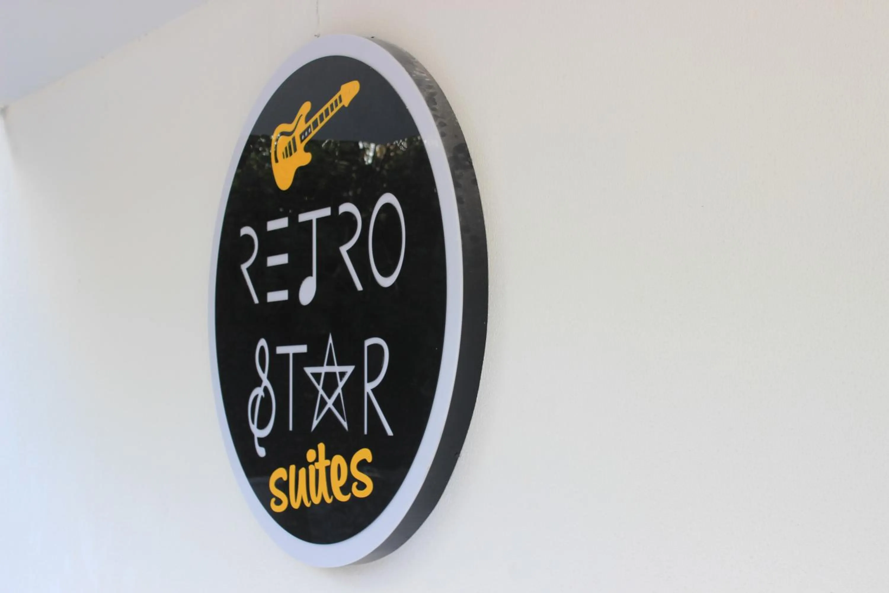 Property logo or sign in Retro Star Suites