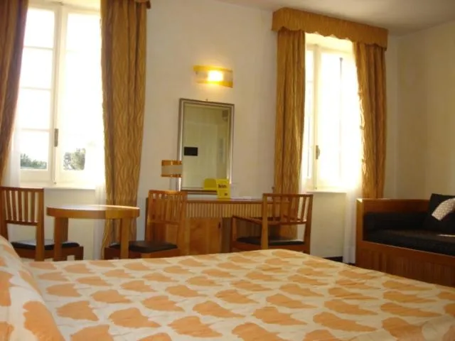 Living room, Bed in Villa Imperiale Hotel