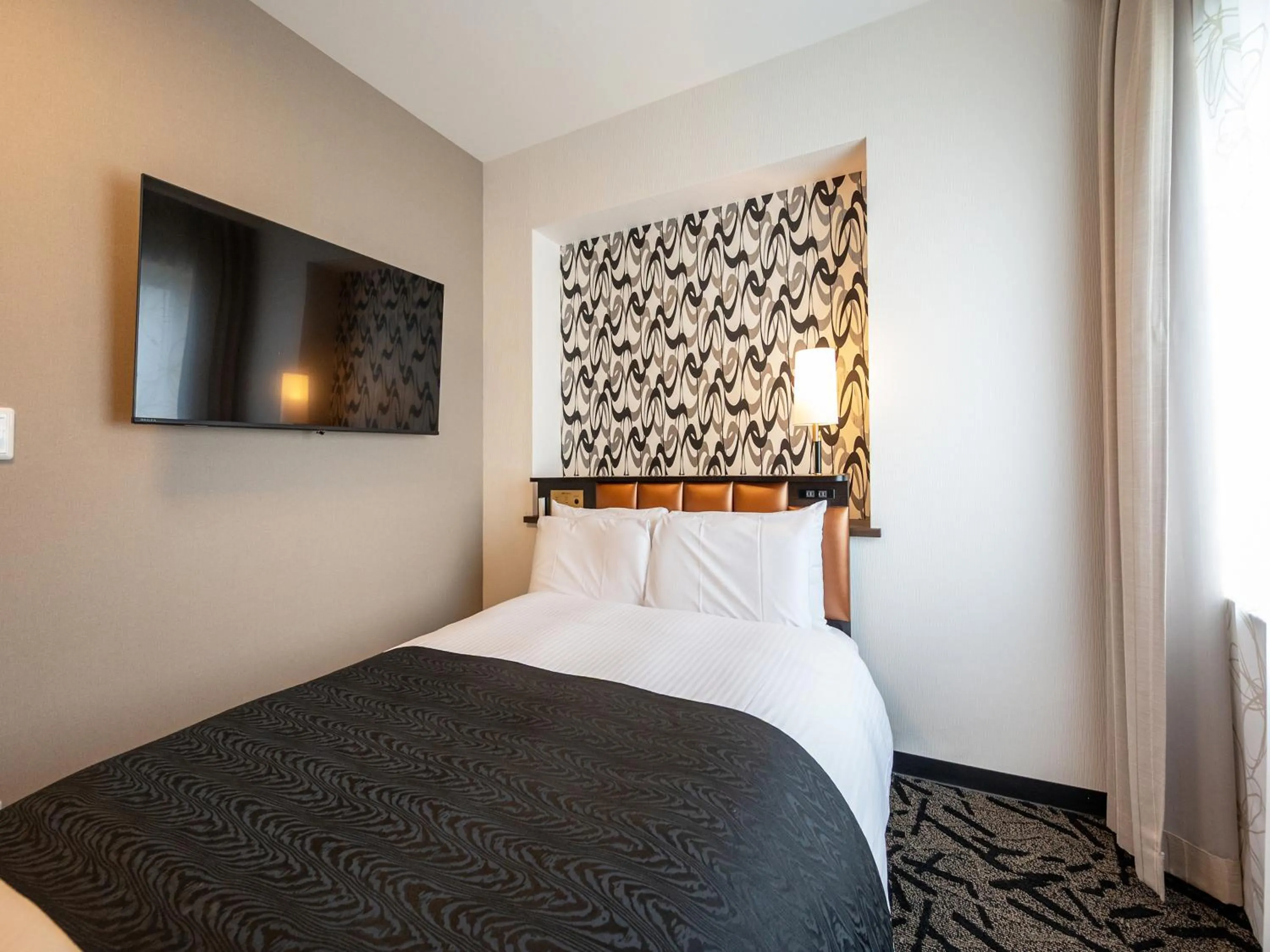 Photo of the whole room, Bed in APA Hotel Shonan Tsujido Ekimae
