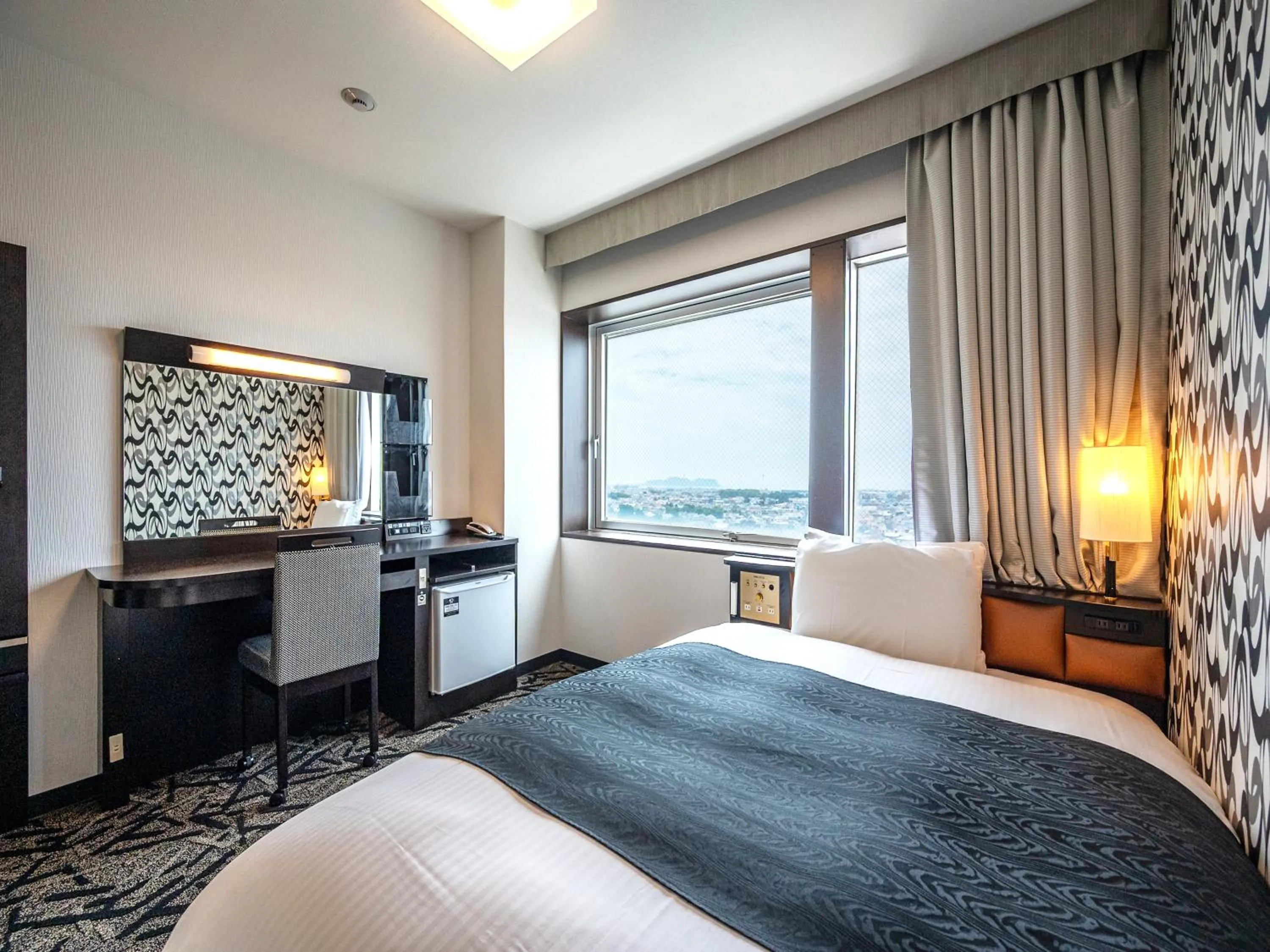 Photo of the whole room, Bed in APA Hotel Shonan Tsujido Ekimae