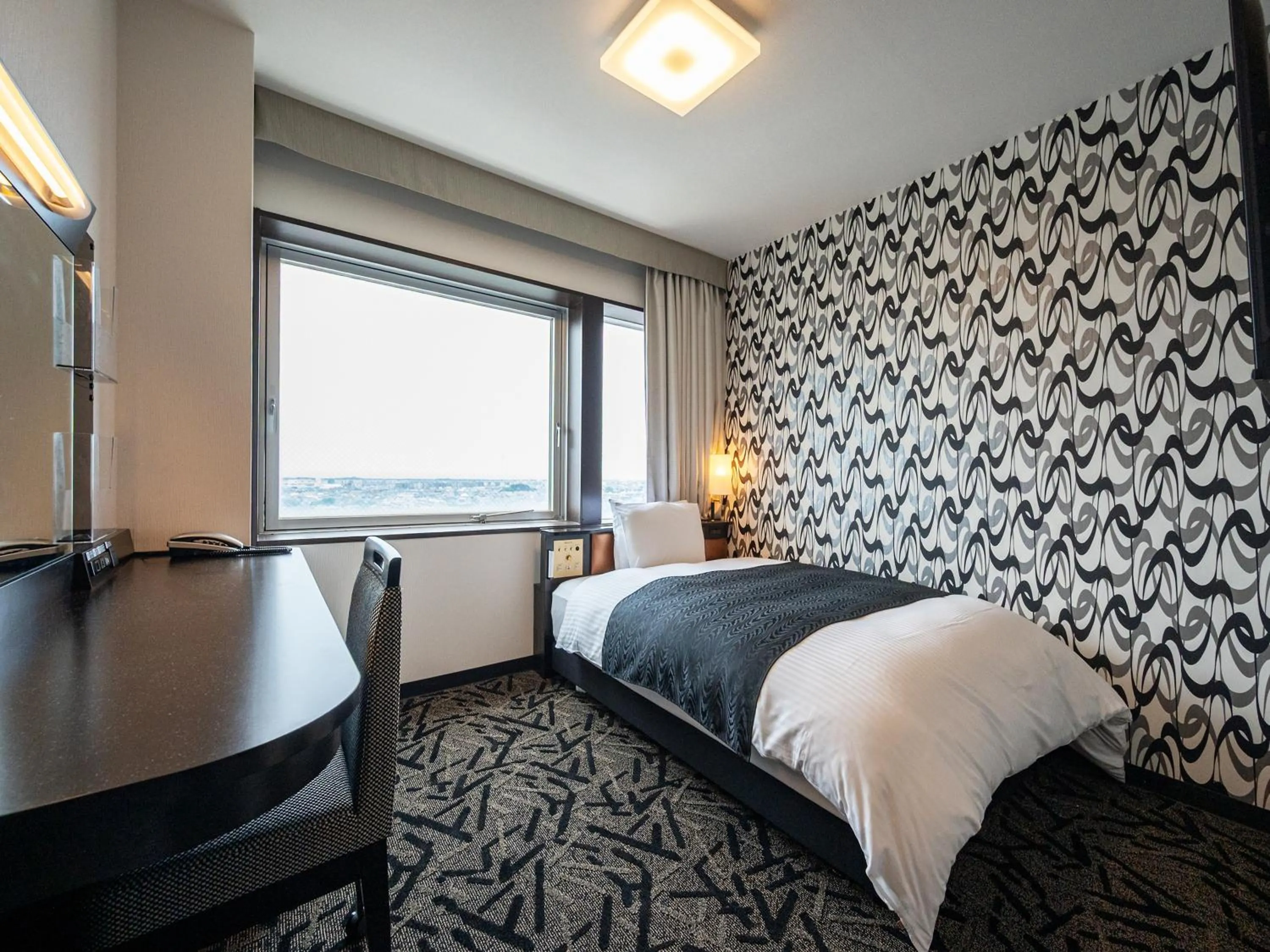Photo of the whole room, Bed in APA Hotel Shonan Tsujido Ekimae