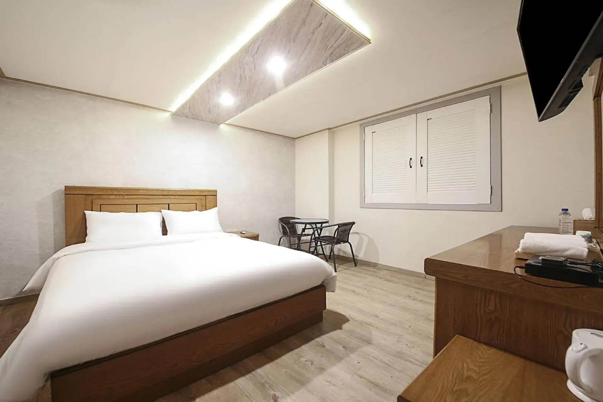 Bed in BOBOS Hotel Bed in BOBOS Hotel