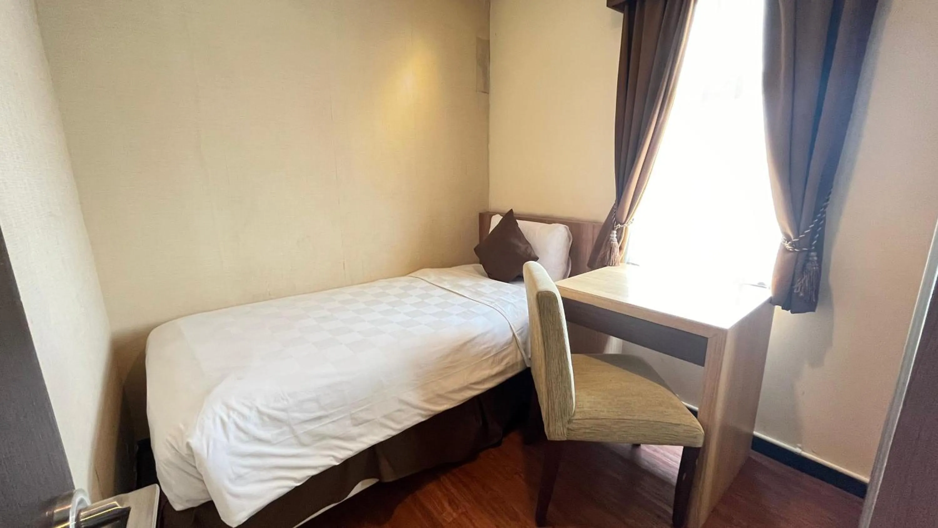 Bedroom, Bed in Grand Serpong Hotel