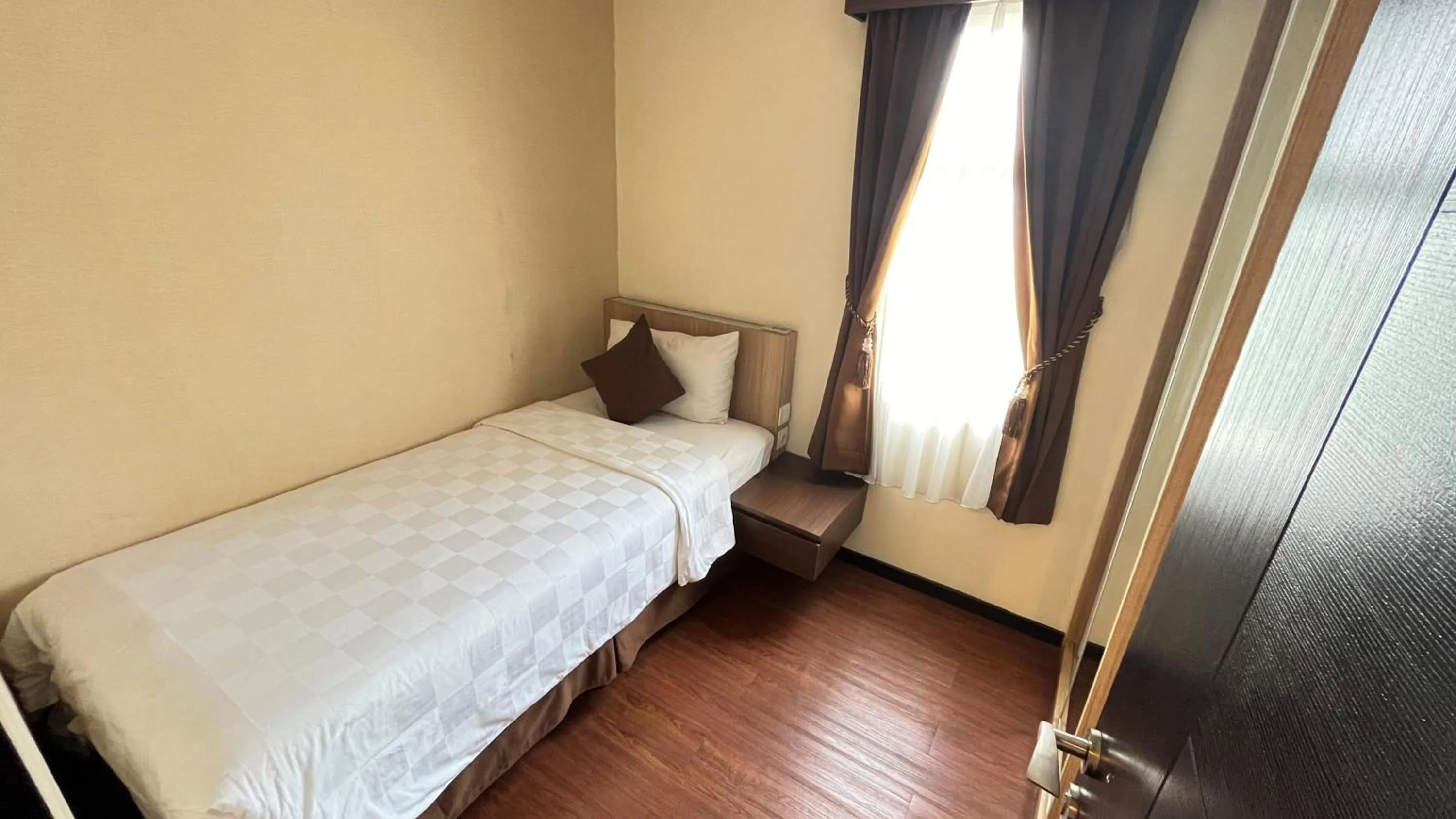 Bedroom, Bed in Grand Serpong Hotel