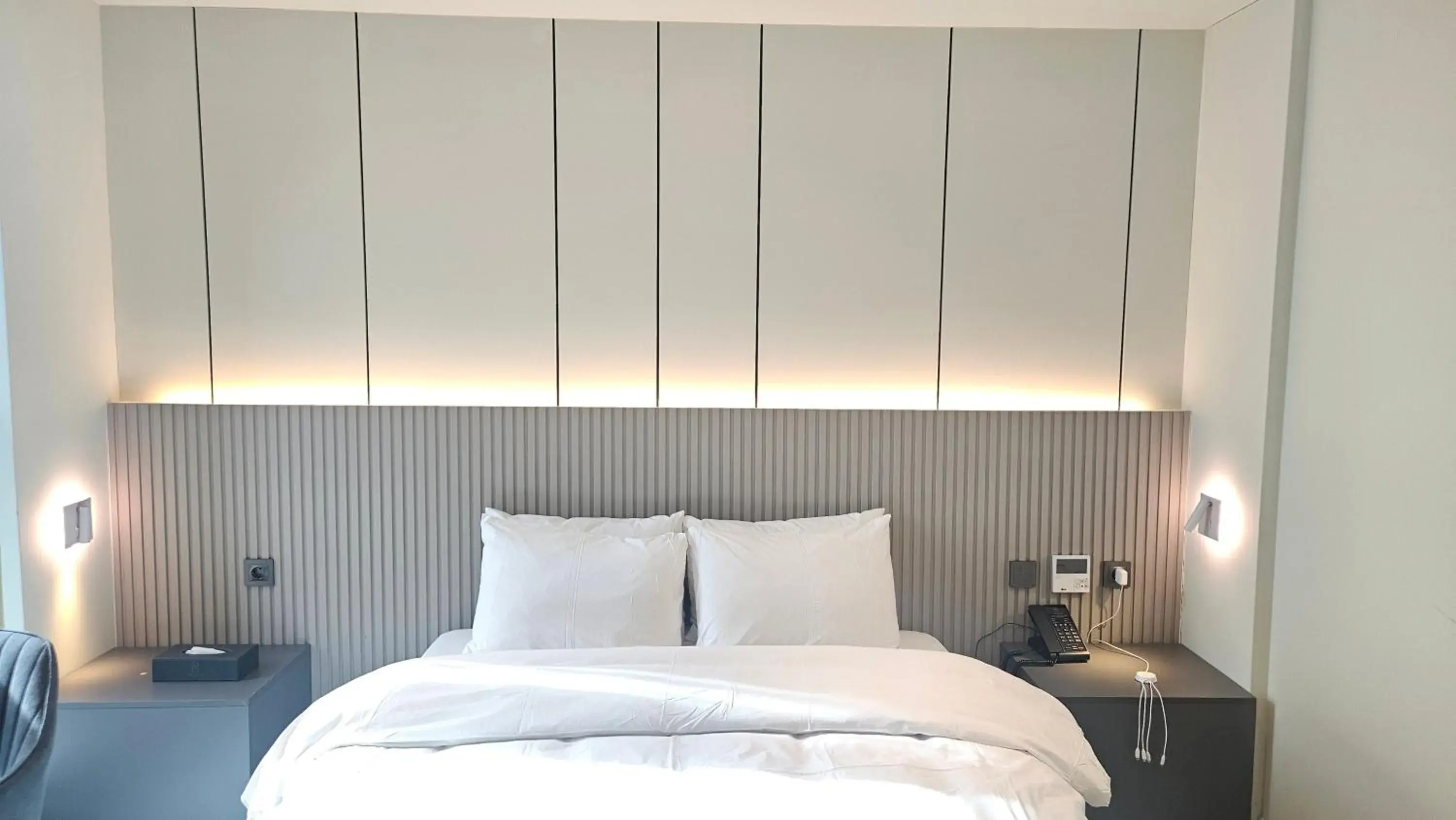 Bed in The Gleam Hotel Bed in The Gleam Hotel