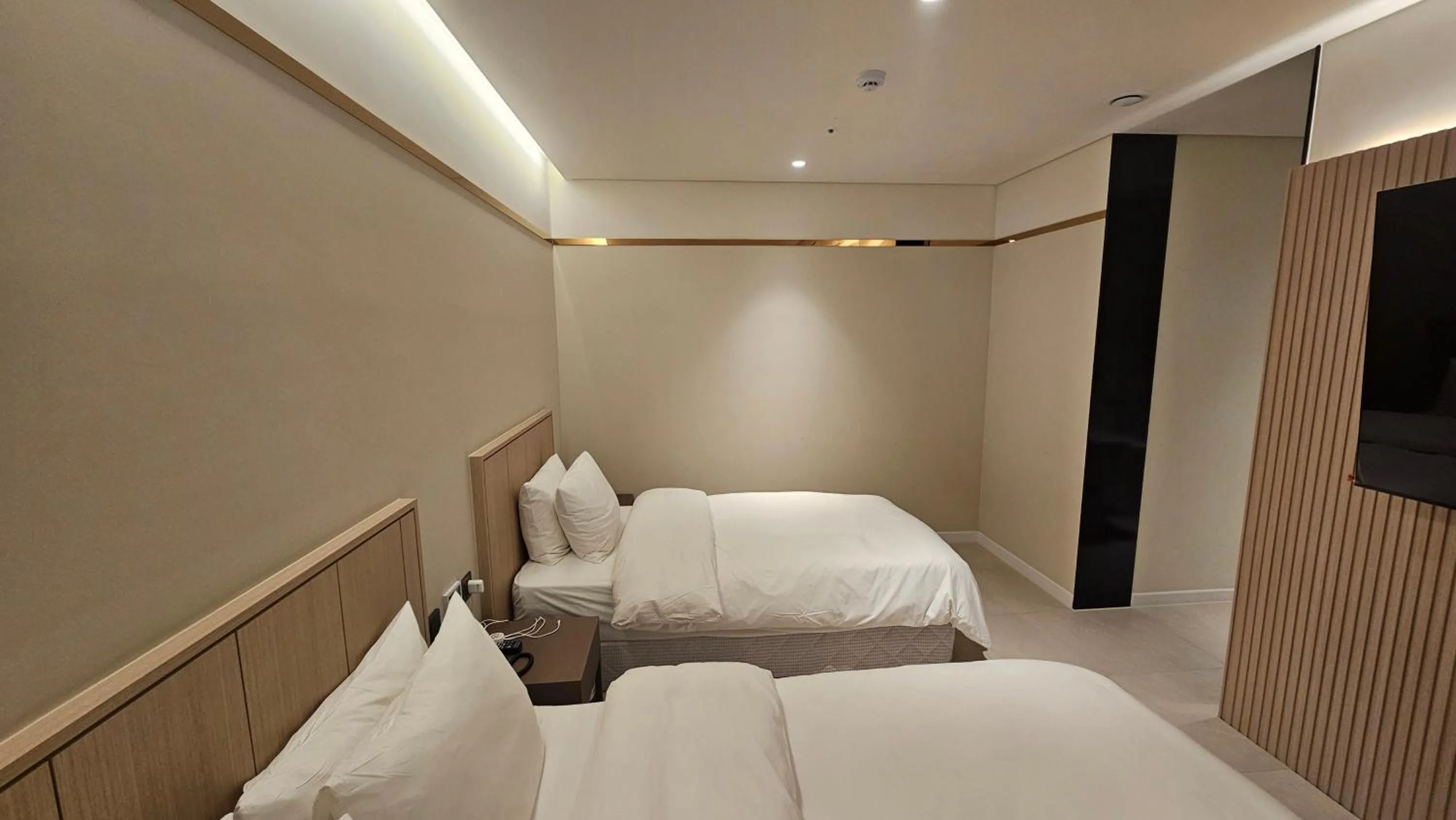 Bedroom in The Gleam Hotel