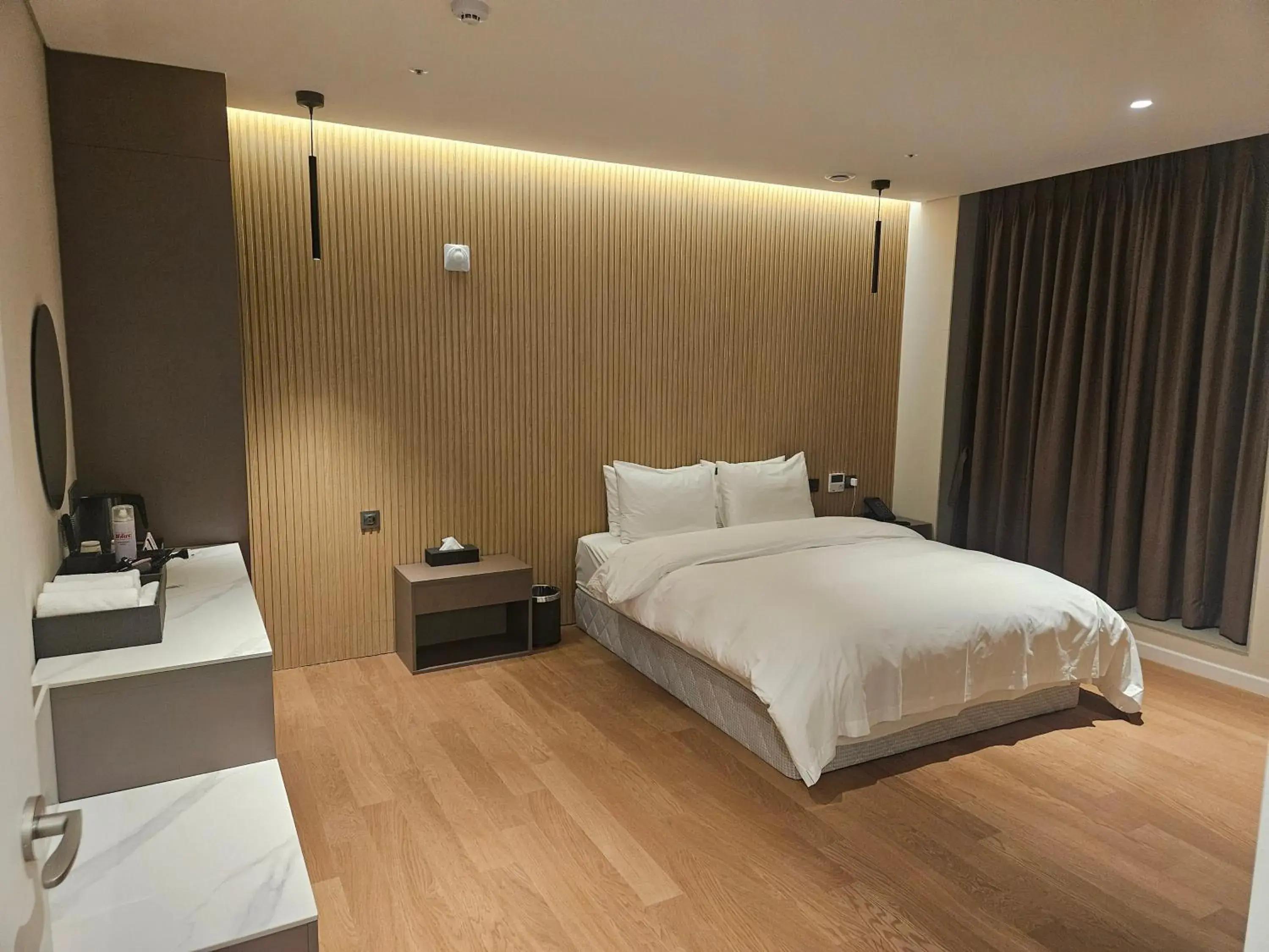 Bed in The Gleam Hotel Bed in The Gleam Hotel