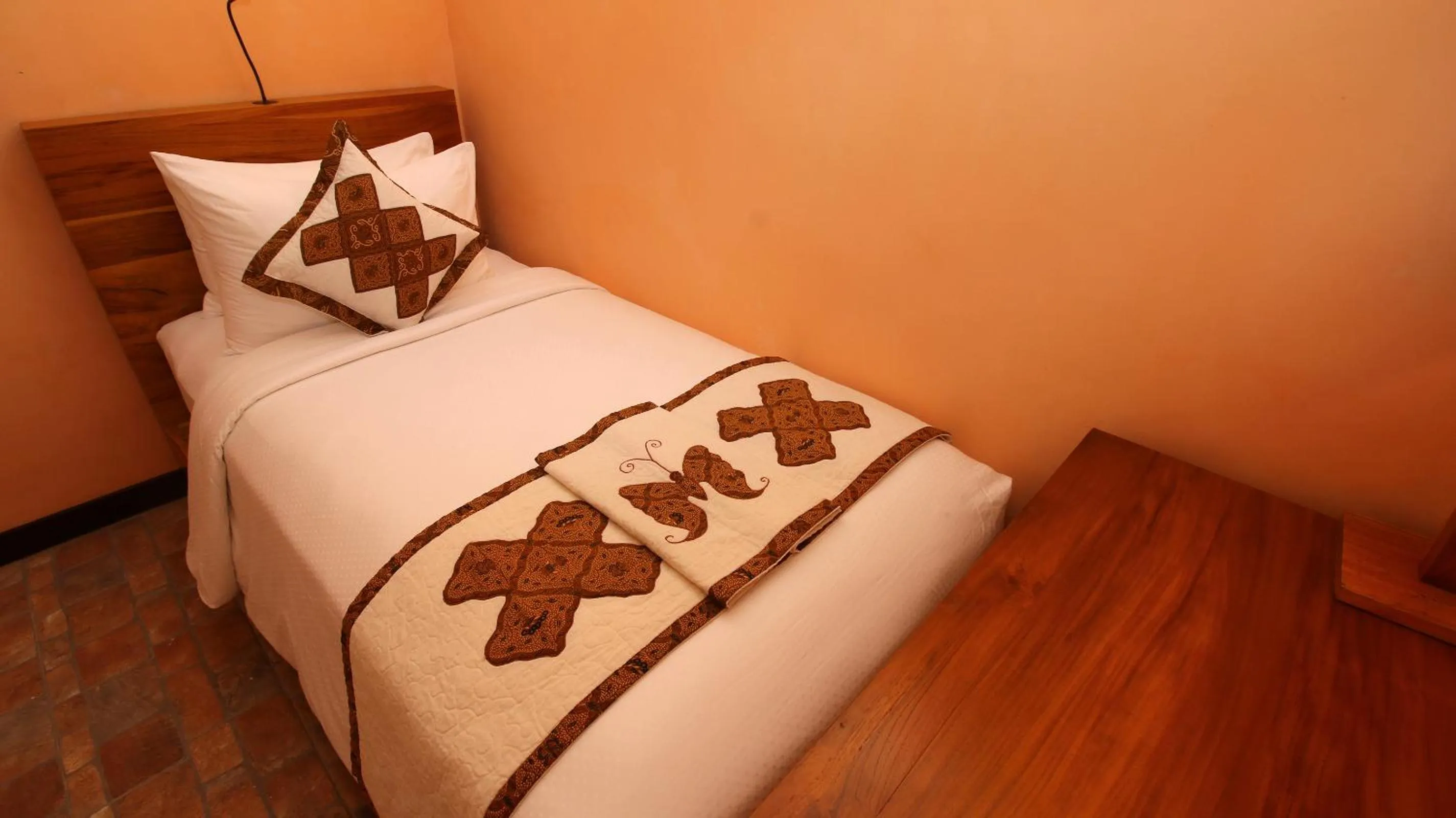 Bed in Jungle Retreat by Kupu Kupu Barong