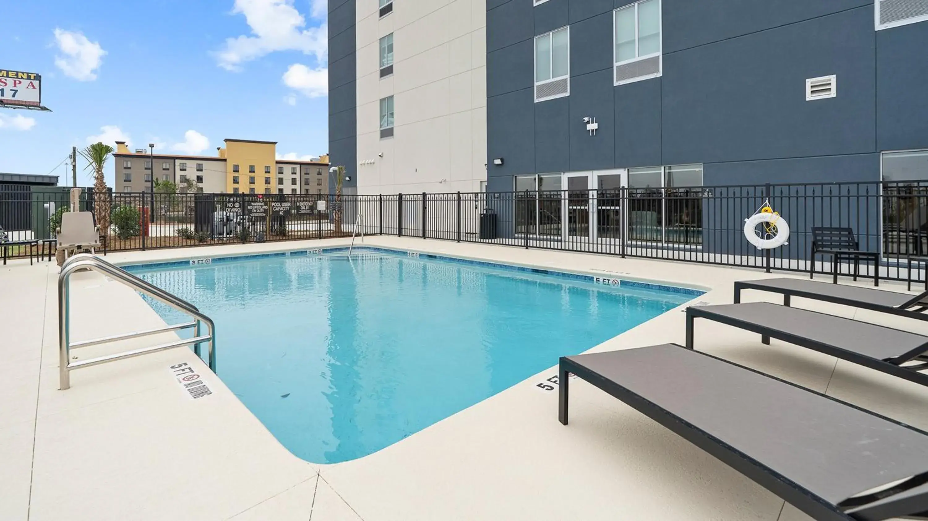 Swimming pool in Candlewood Suites Perry-National Fairground Area by IHG Swimming pool in Candlewood Suites Perry-National Fairground Area by IHG