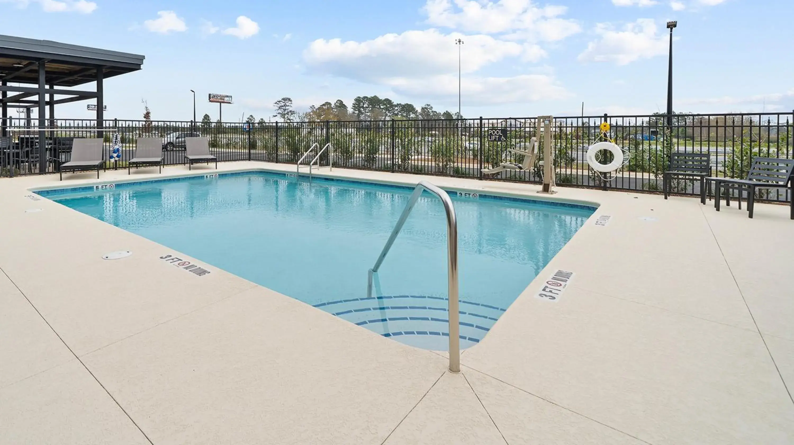 Swimming pool in Candlewood Suites Perry-National Fairground Area by IHG Swimming pool in Candlewood Suites Perry-National Fairground Area by IHG