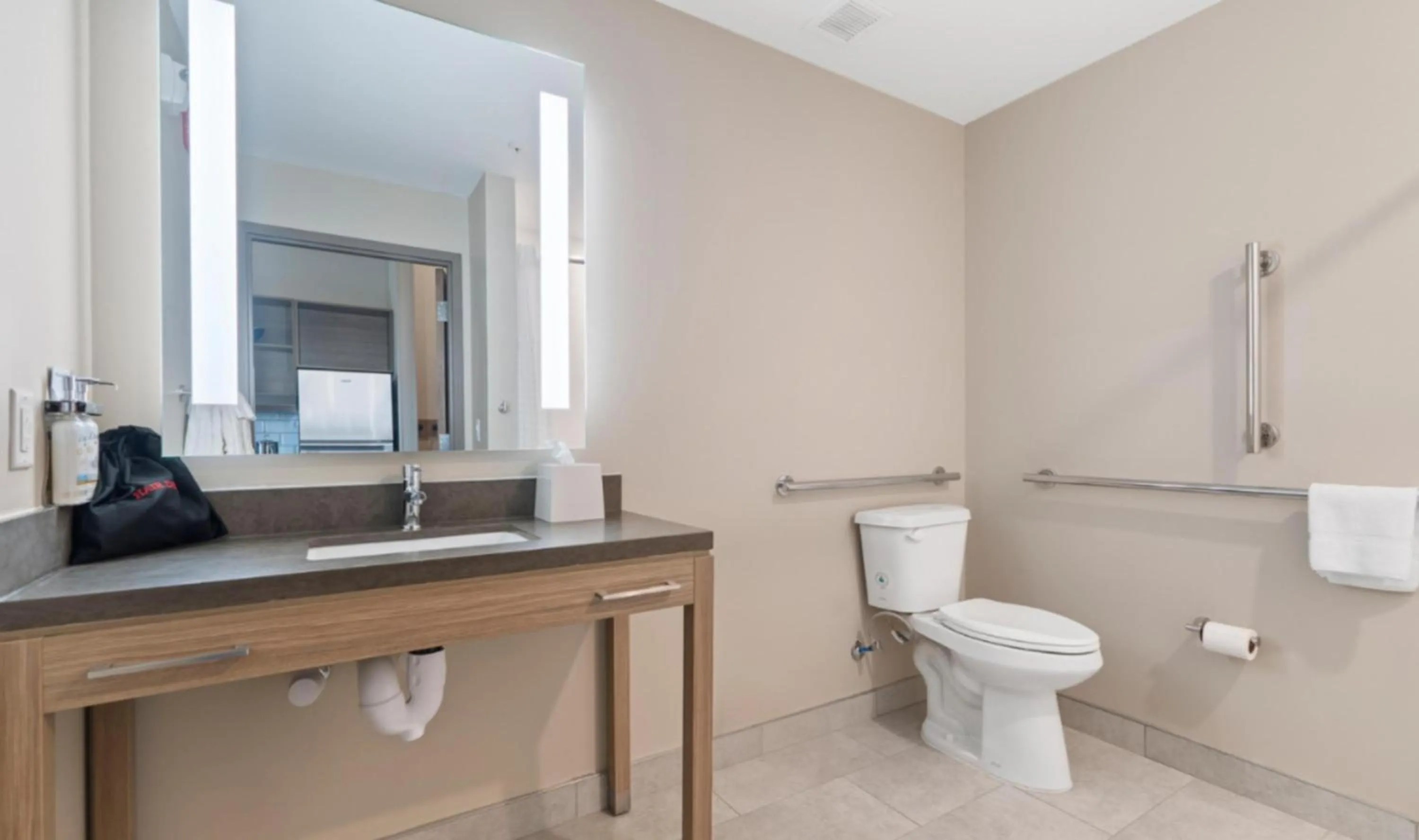 Bathroom in Candlewood Suites Perry-National Fairground Area by IHG