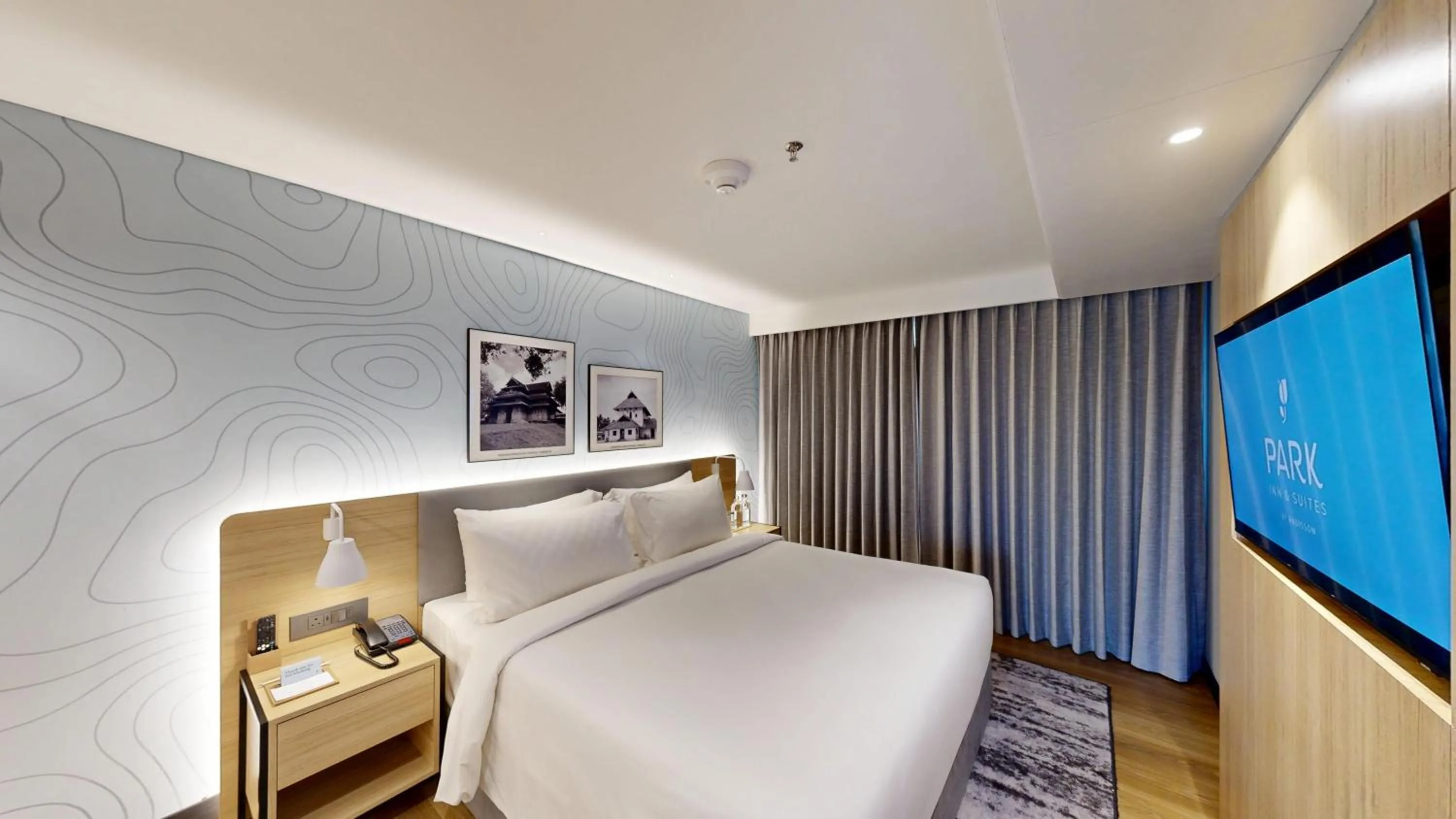 Bedroom, Bed in Park Inn & Suites by Radisson Thrissur East Fort