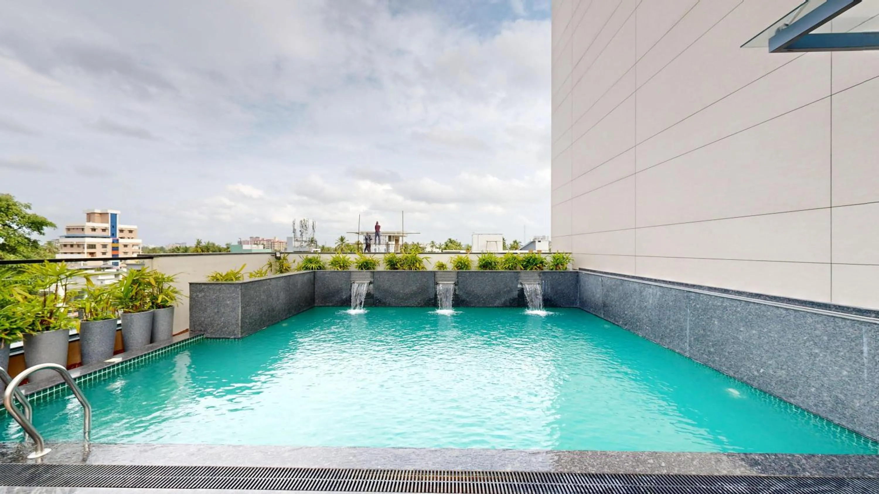 Pool view in Park Inn & Suites by Radisson Thrissur East Fort