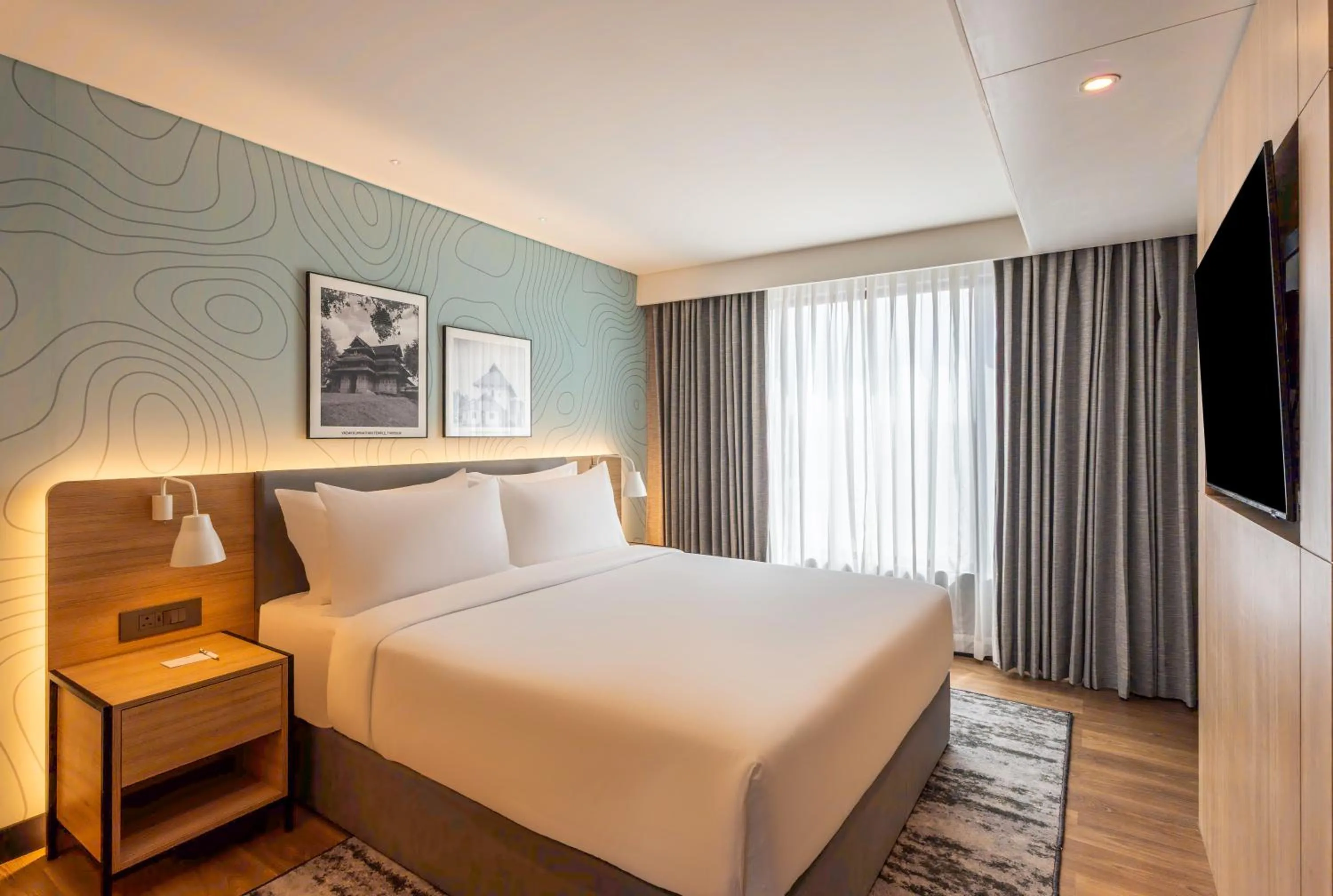 Bedroom, Bed in Park Inn & Suites by Radisson Thrissur East Fort