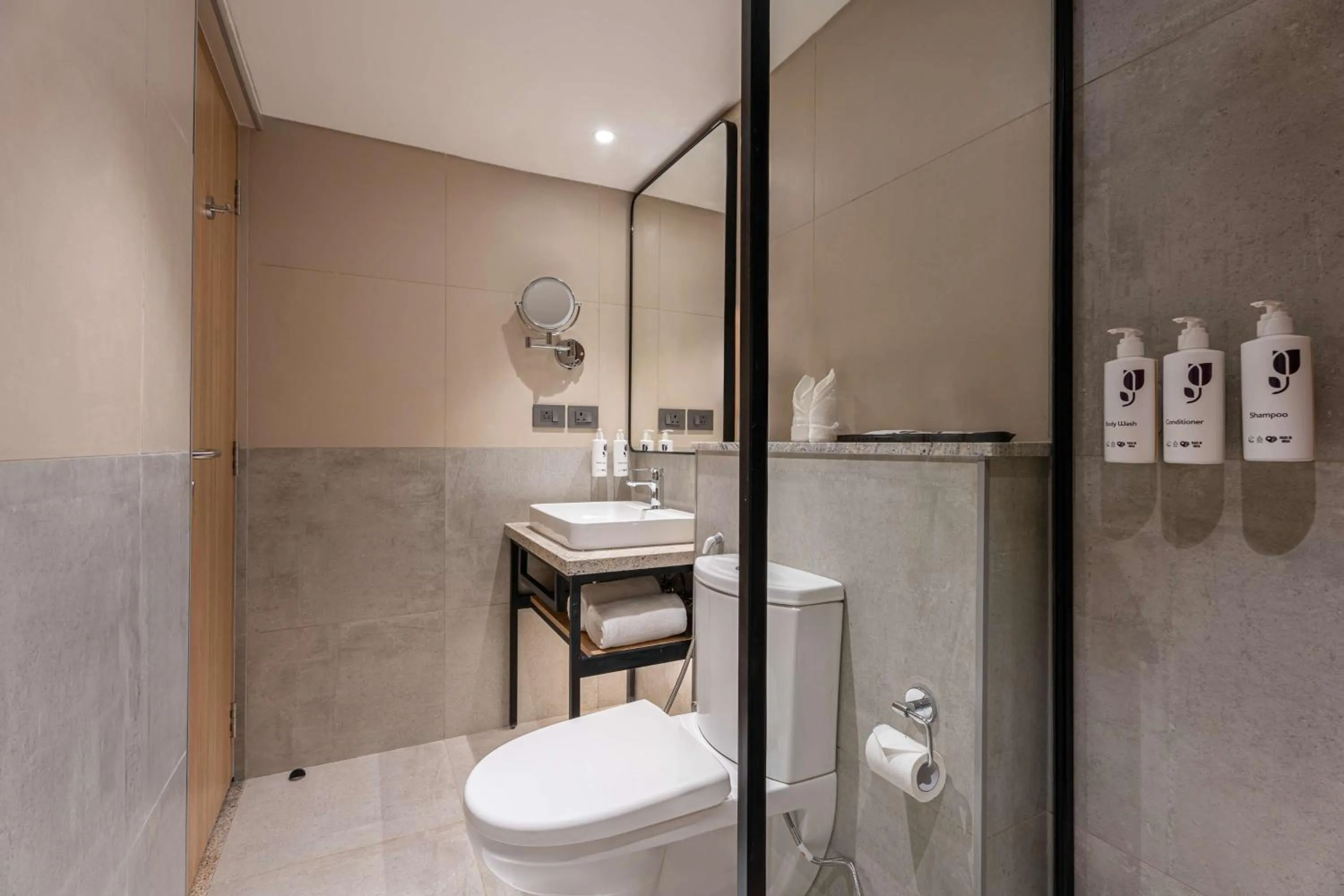 Bathroom in Park Inn & Suites by Radisson Thrissur East Fort