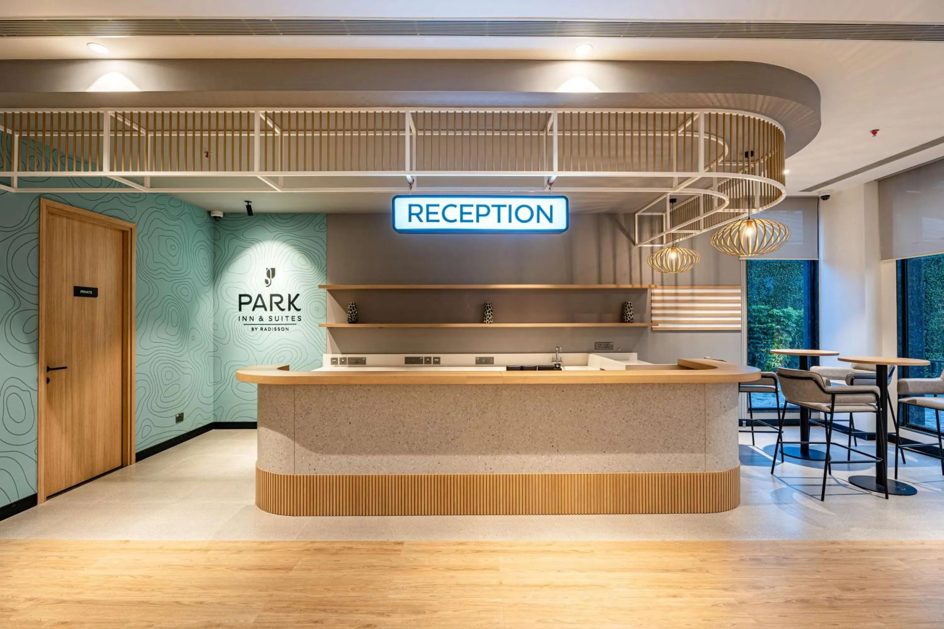 Lobby or reception in Park Inn & Suites by Radisson Thrissur East Fort