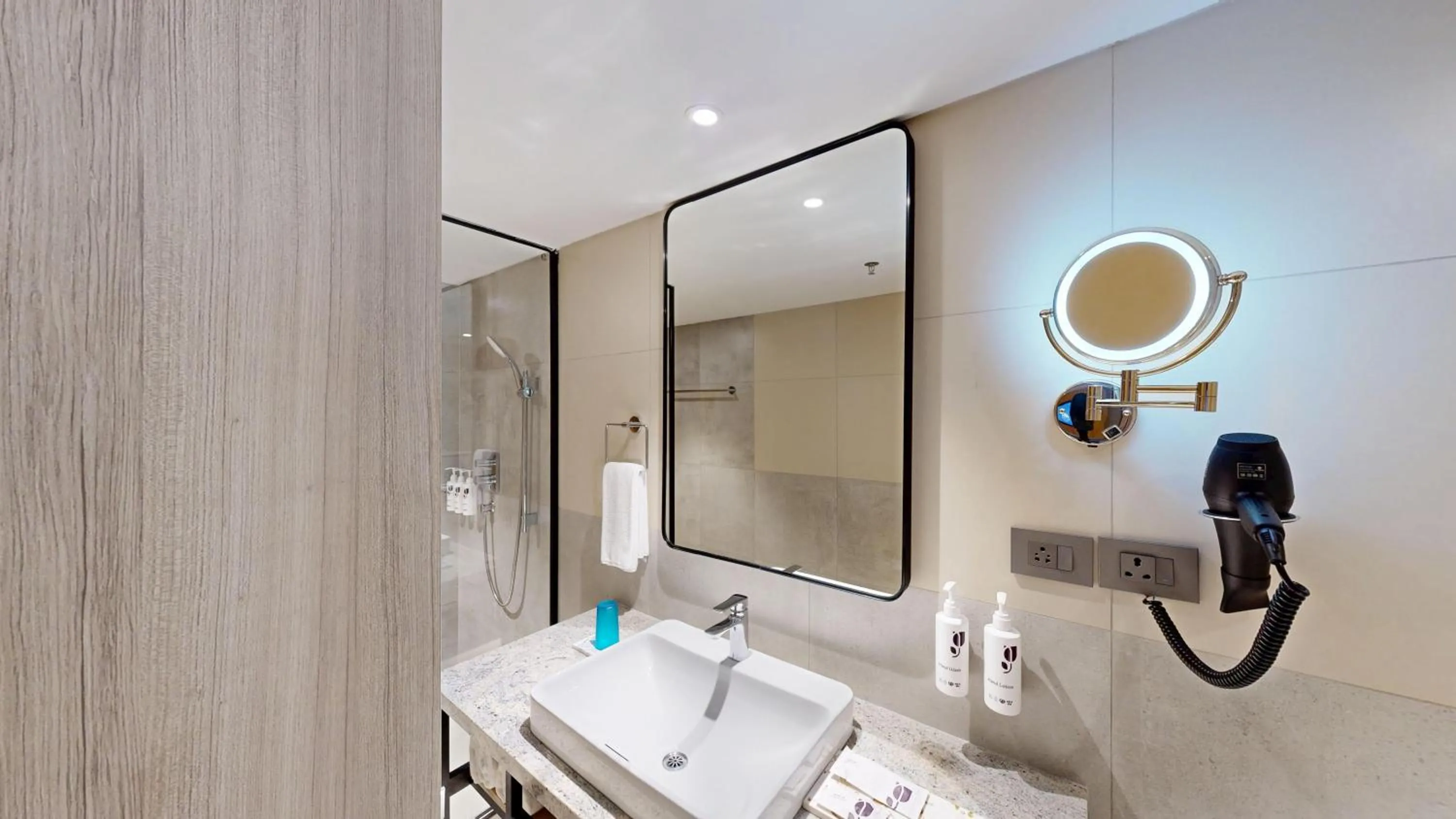 Bathroom in Park Inn & Suites by Radisson Thrissur East Fort