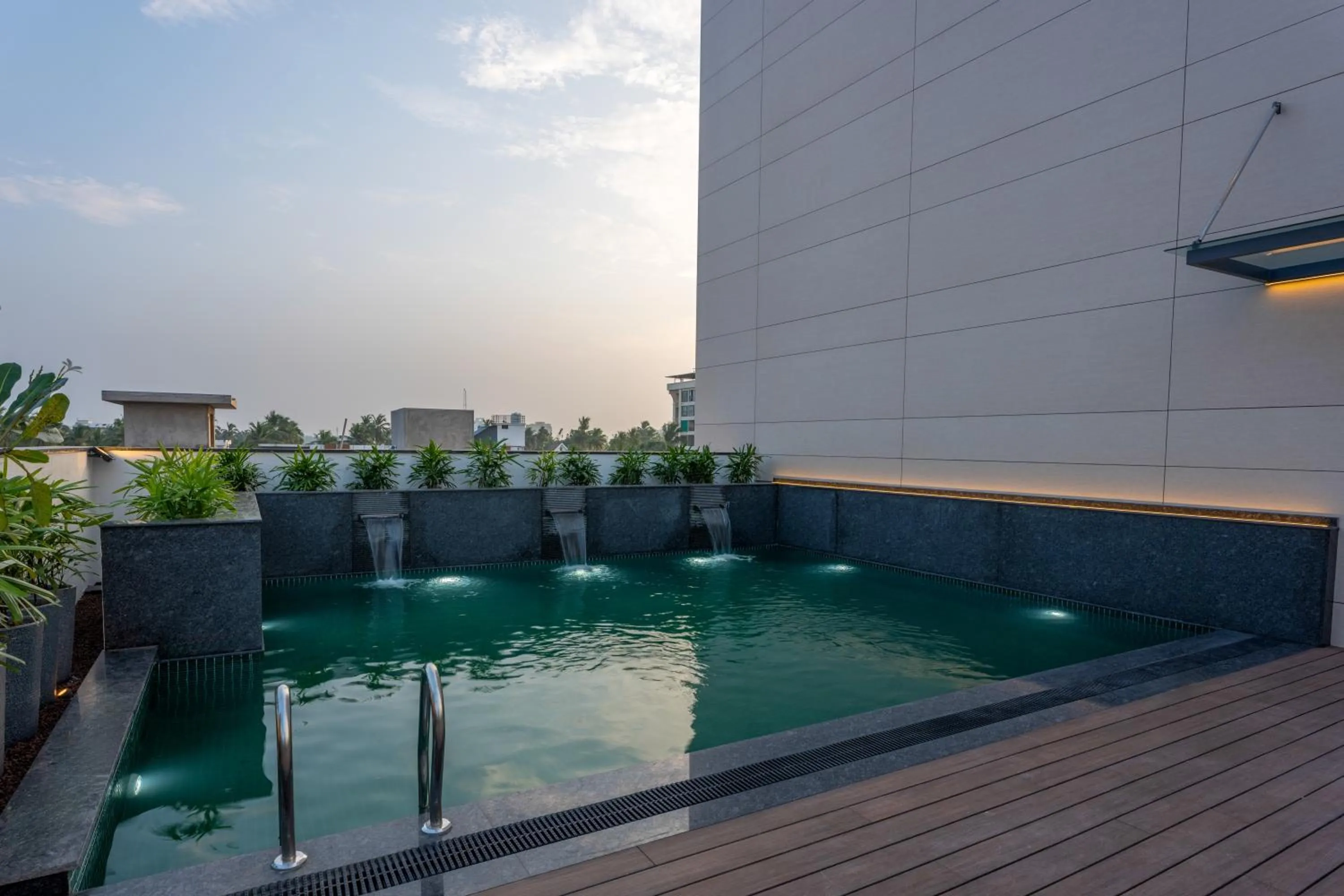 Swimming pool in Park Inn & Suites by Radisson Thrissur East Fort