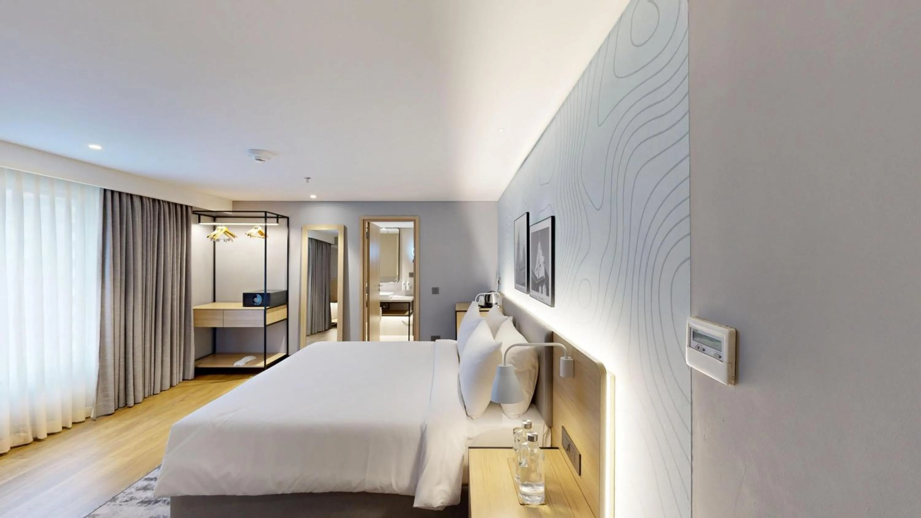 Bedroom, Bed in Park Inn & Suites by Radisson Thrissur East Fort