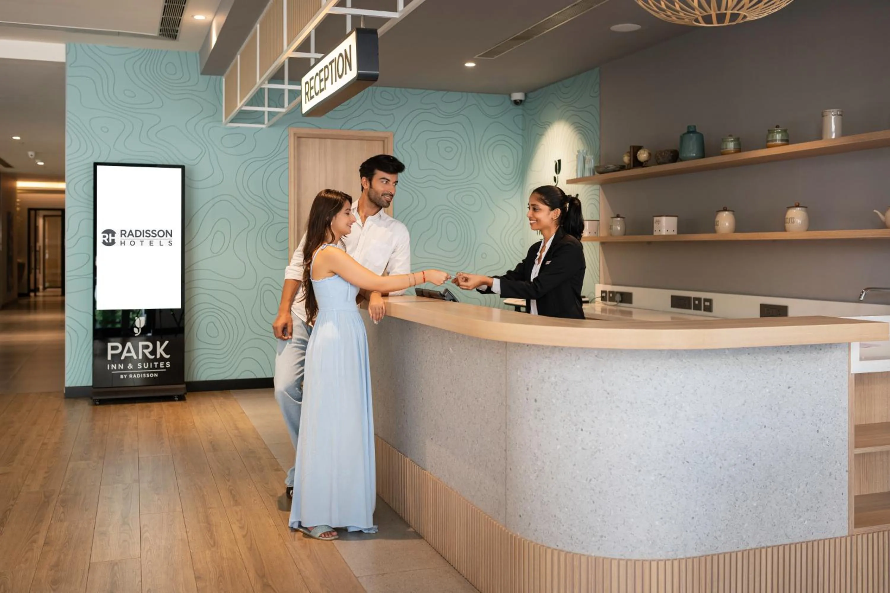 Lobby or reception in Park Inn & Suites by Radisson Thrissur East Fort