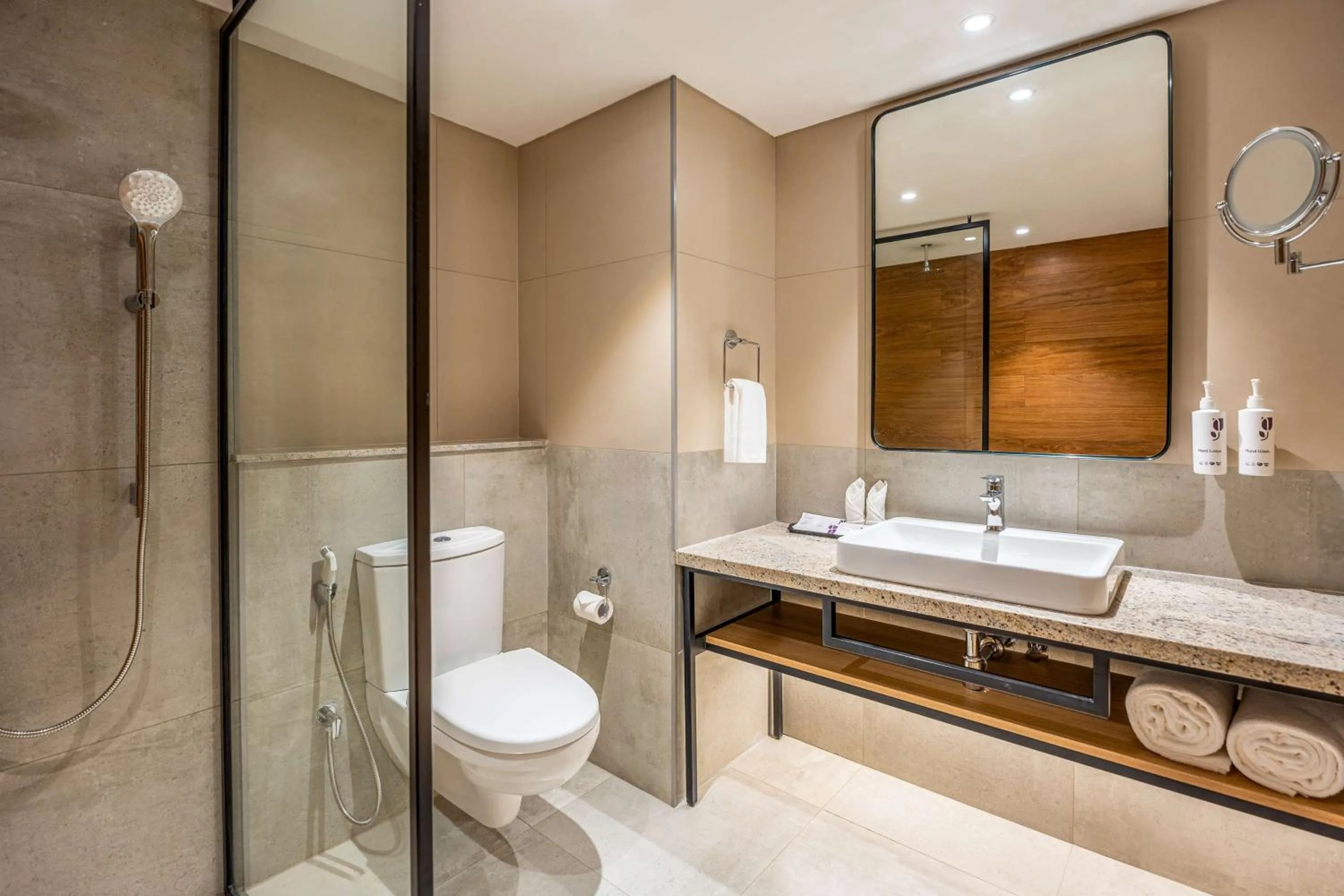 Bathroom in Park Inn & Suites by Radisson Thrissur East Fort