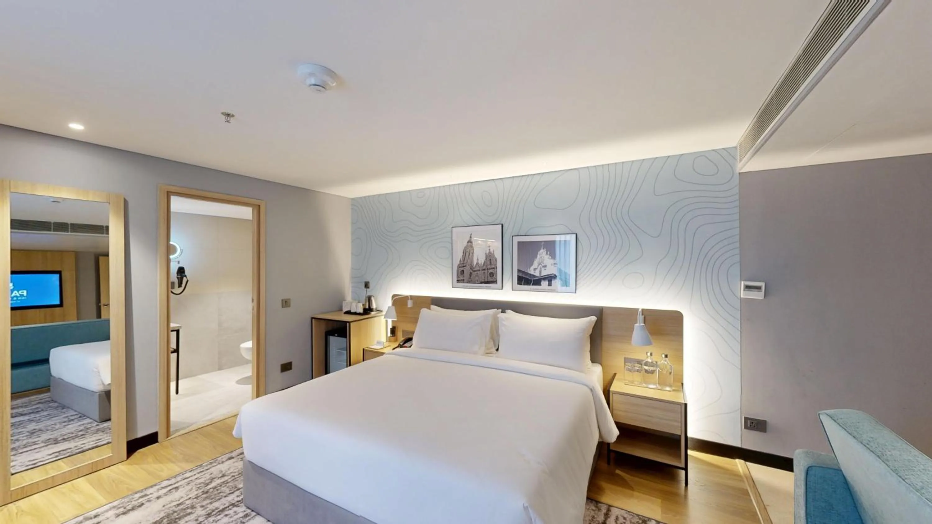 Bedroom, Bed in Park Inn & Suites by Radisson Thrissur East Fort