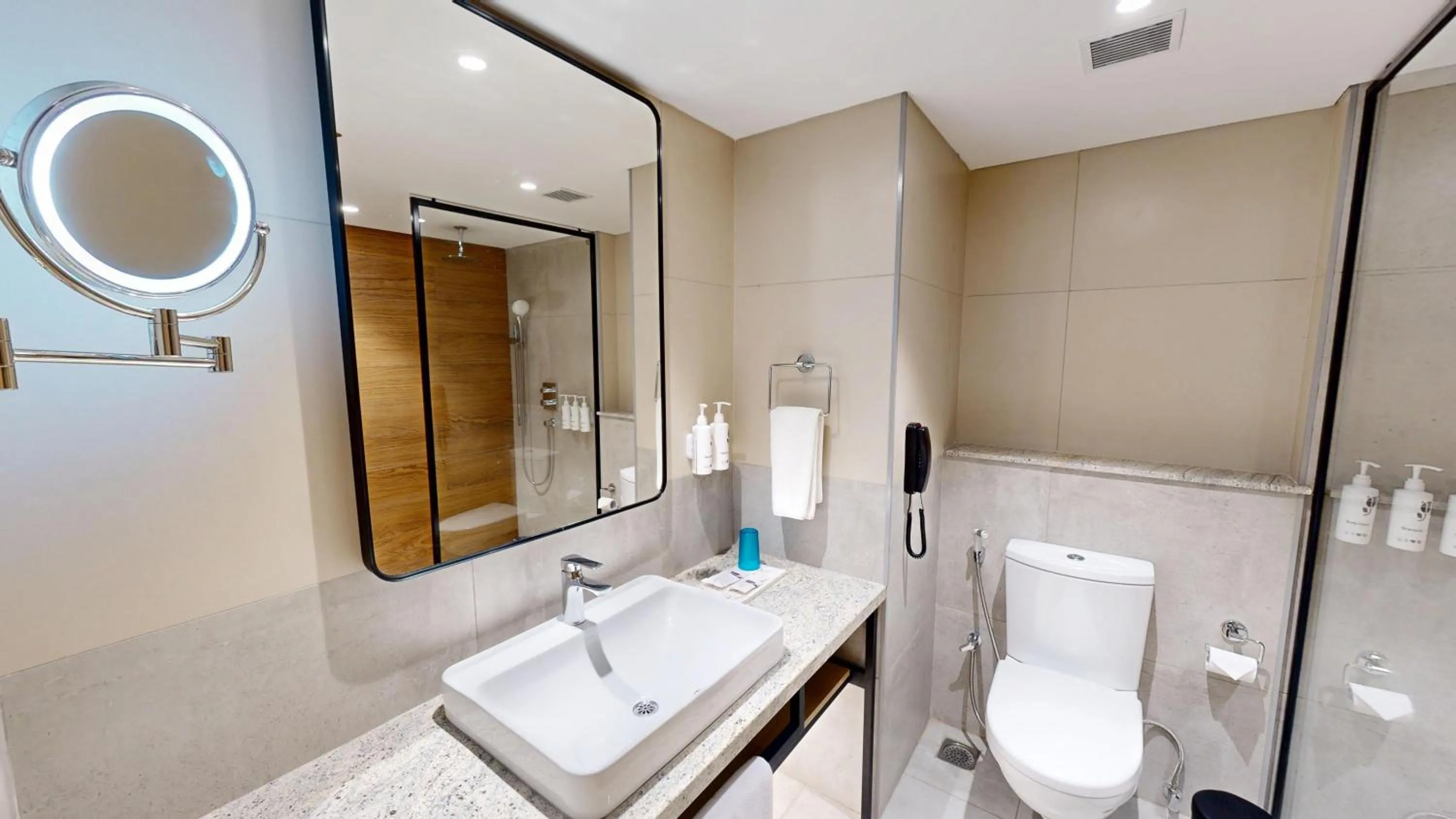 Bathroom in Park Inn & Suites by Radisson Thrissur East Fort
