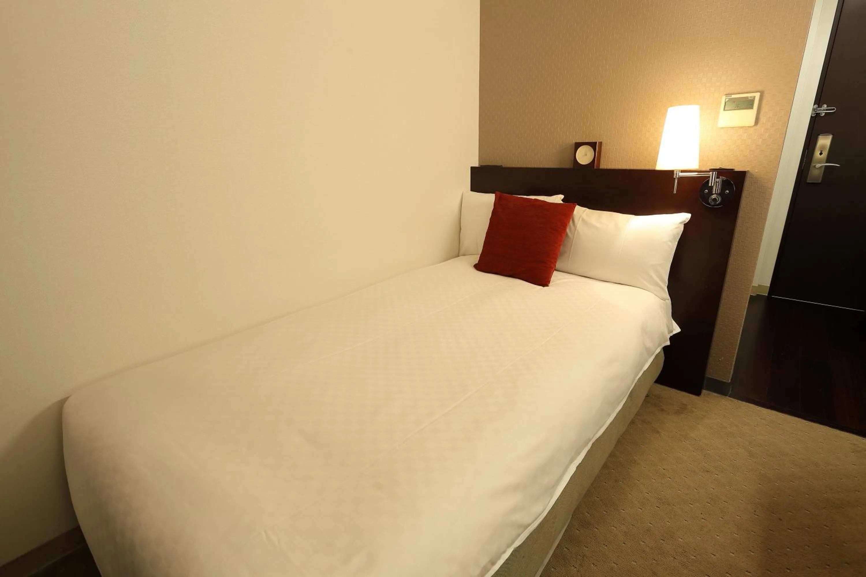 Bed in Hotel Massimo Mishima