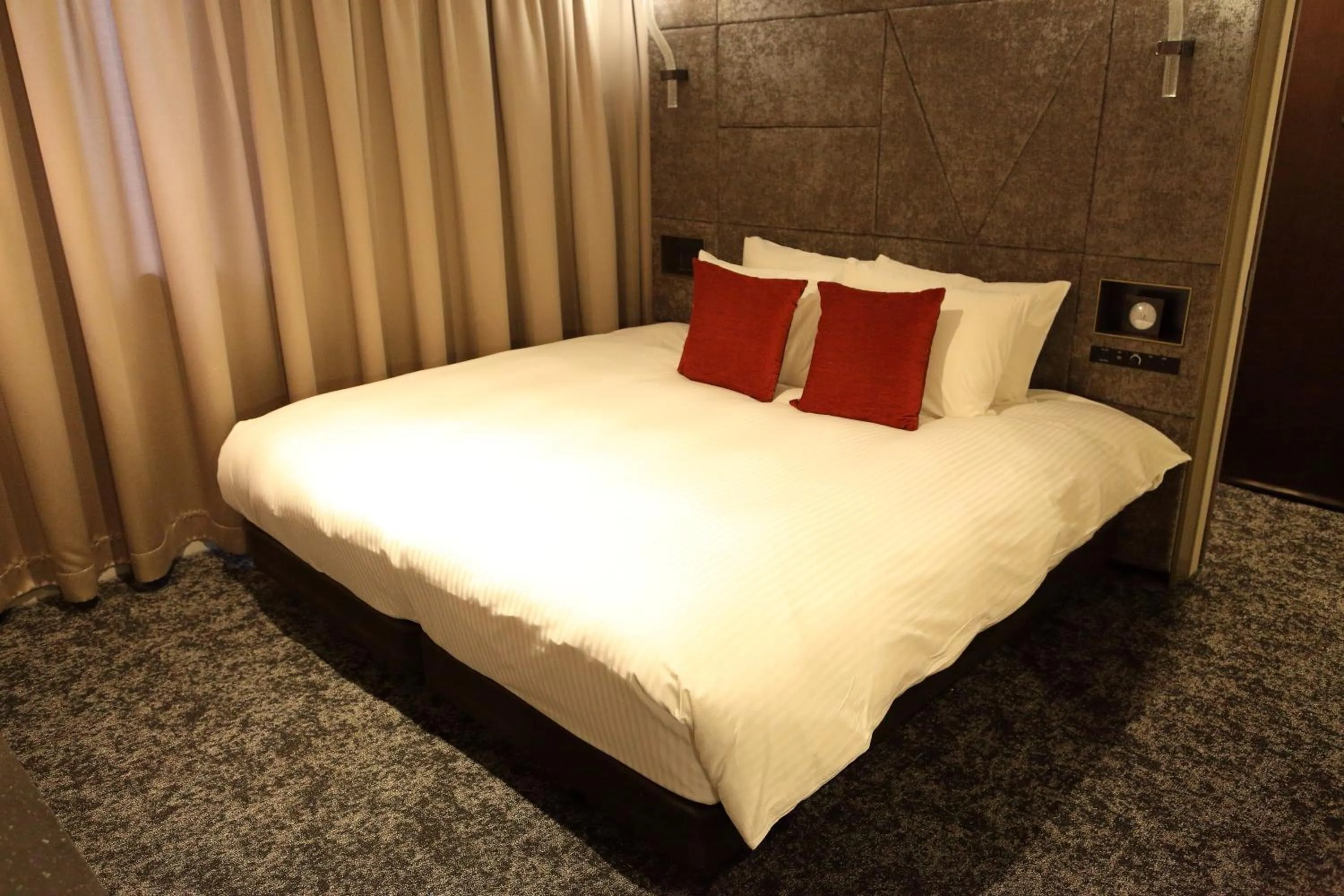 Bed in Hotel Massimo Mishima