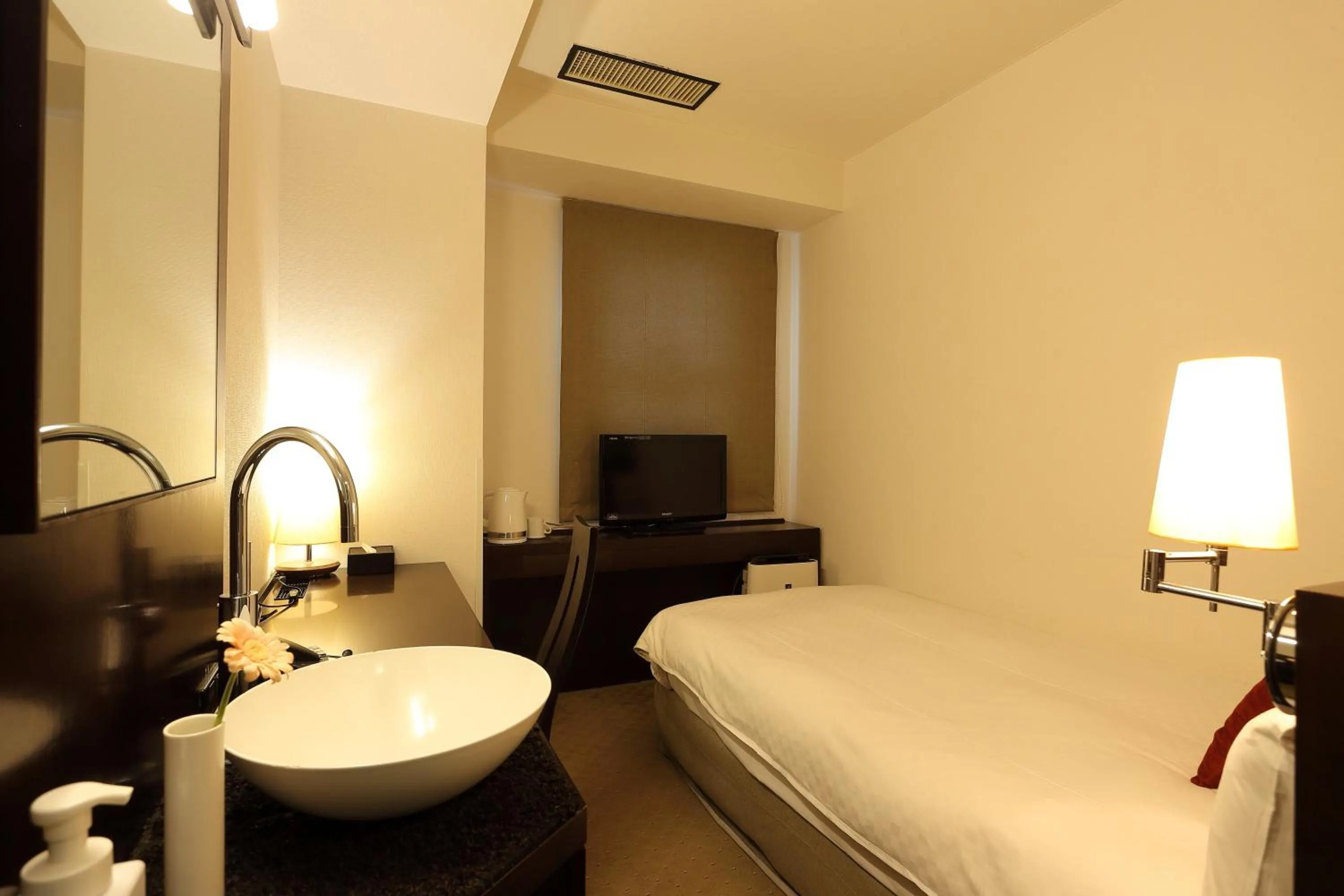 Bed in Hotel Massimo Mishima