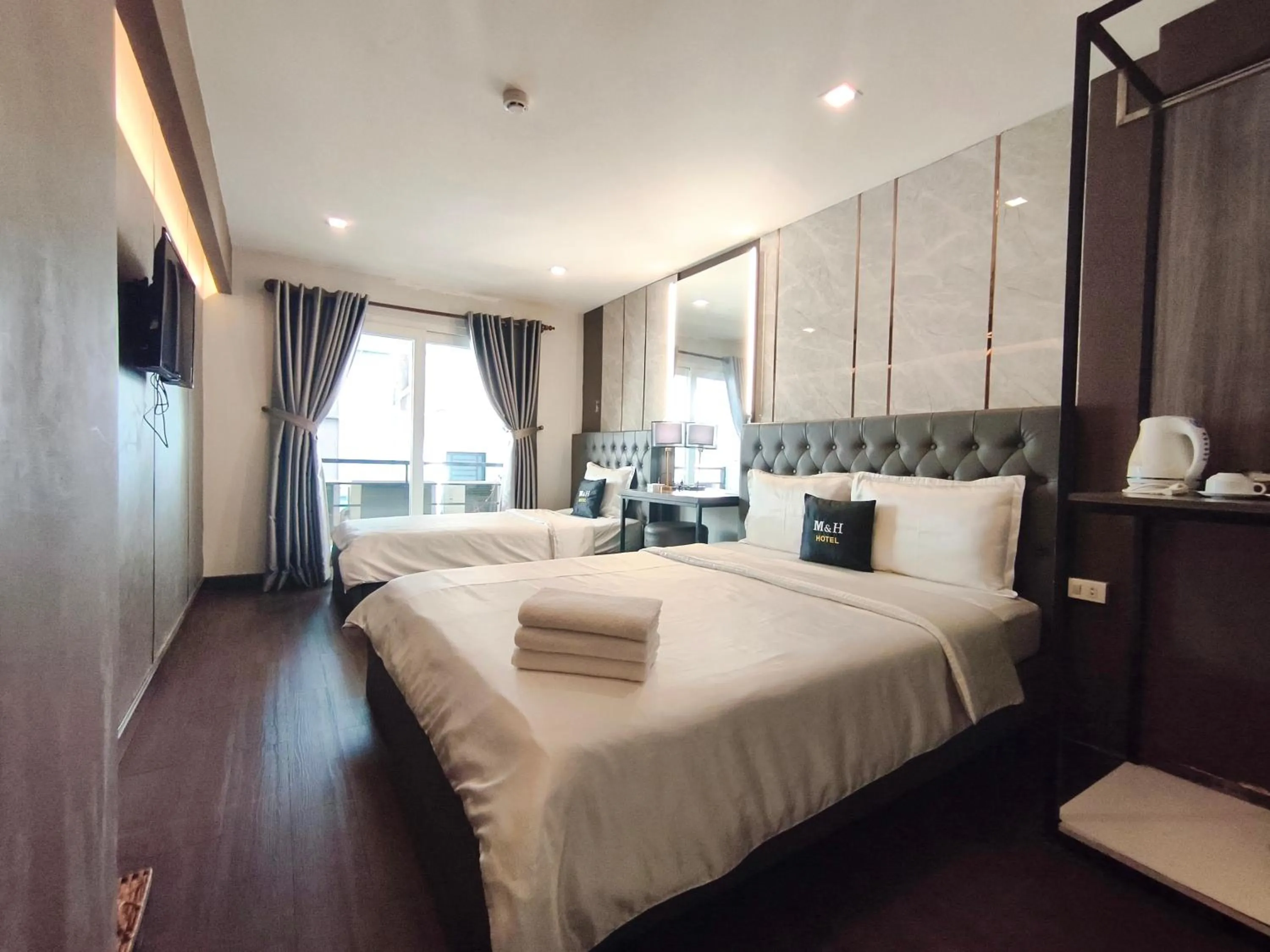 Photo of the whole room, Bed in M&H Hotel