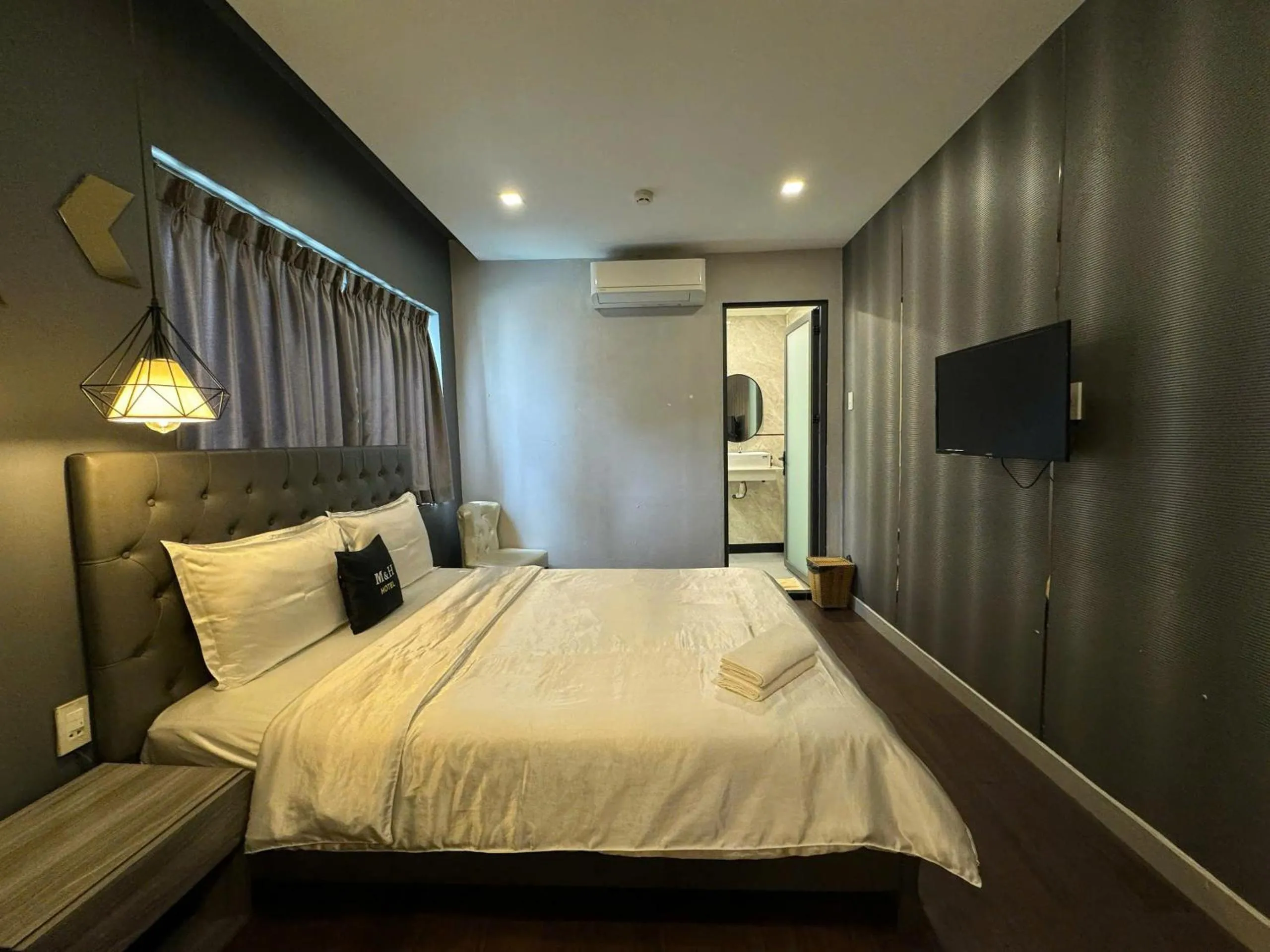 Photo of the whole room, Bed in M&H Hotel