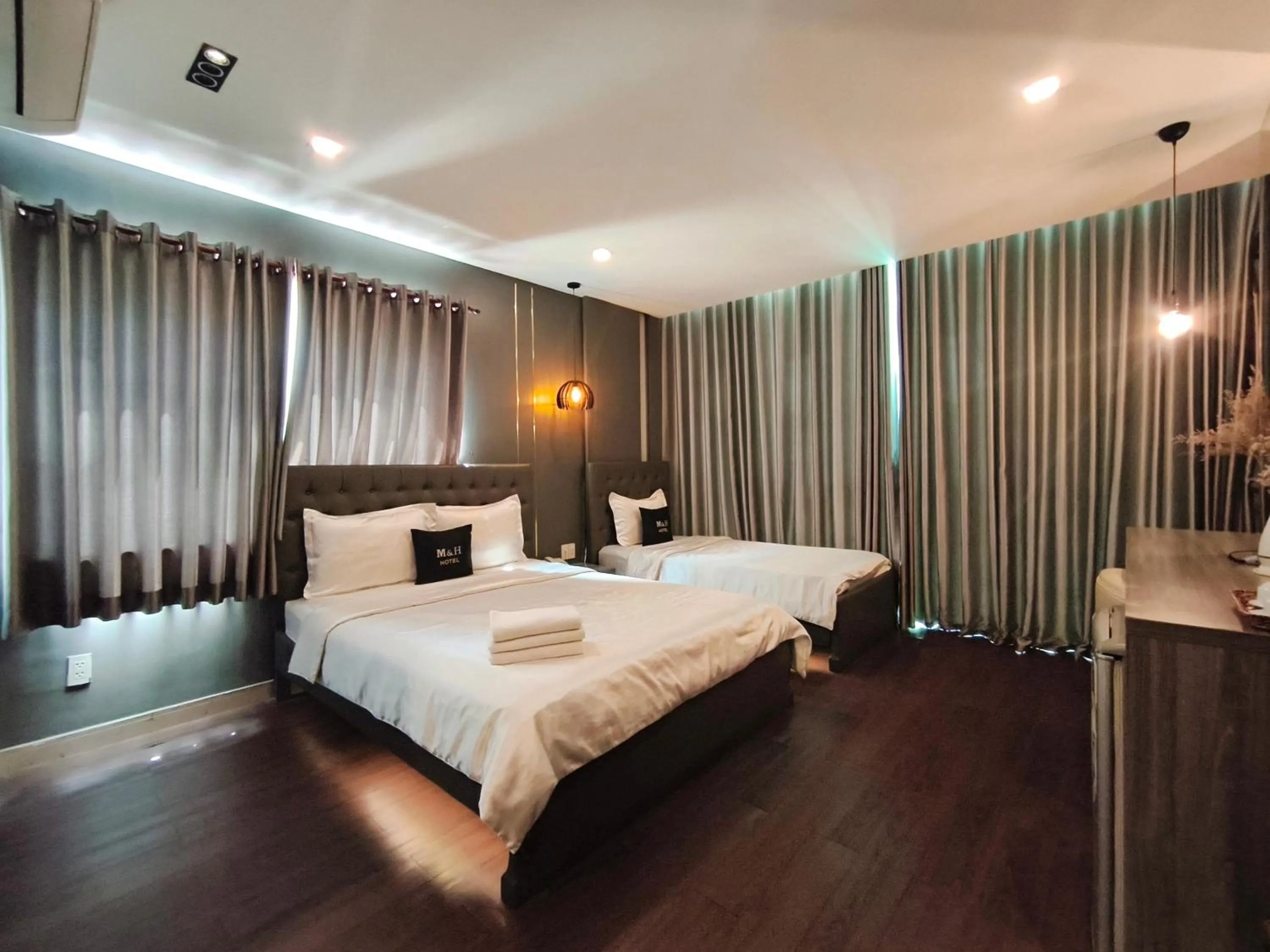 Photo of the whole room, Bed in M&H Hotel