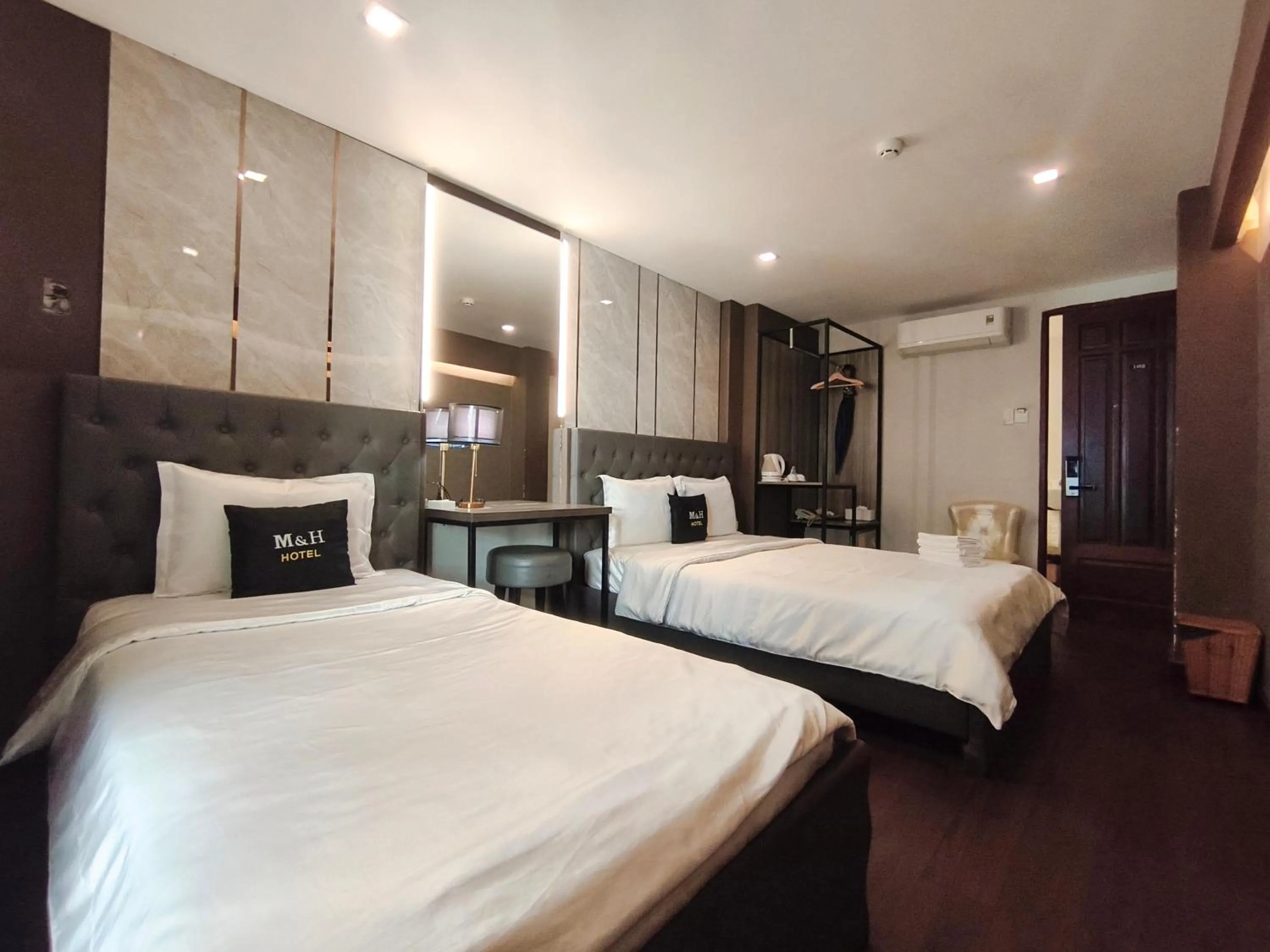 Photo of the whole room, Bed in M&H Hotel