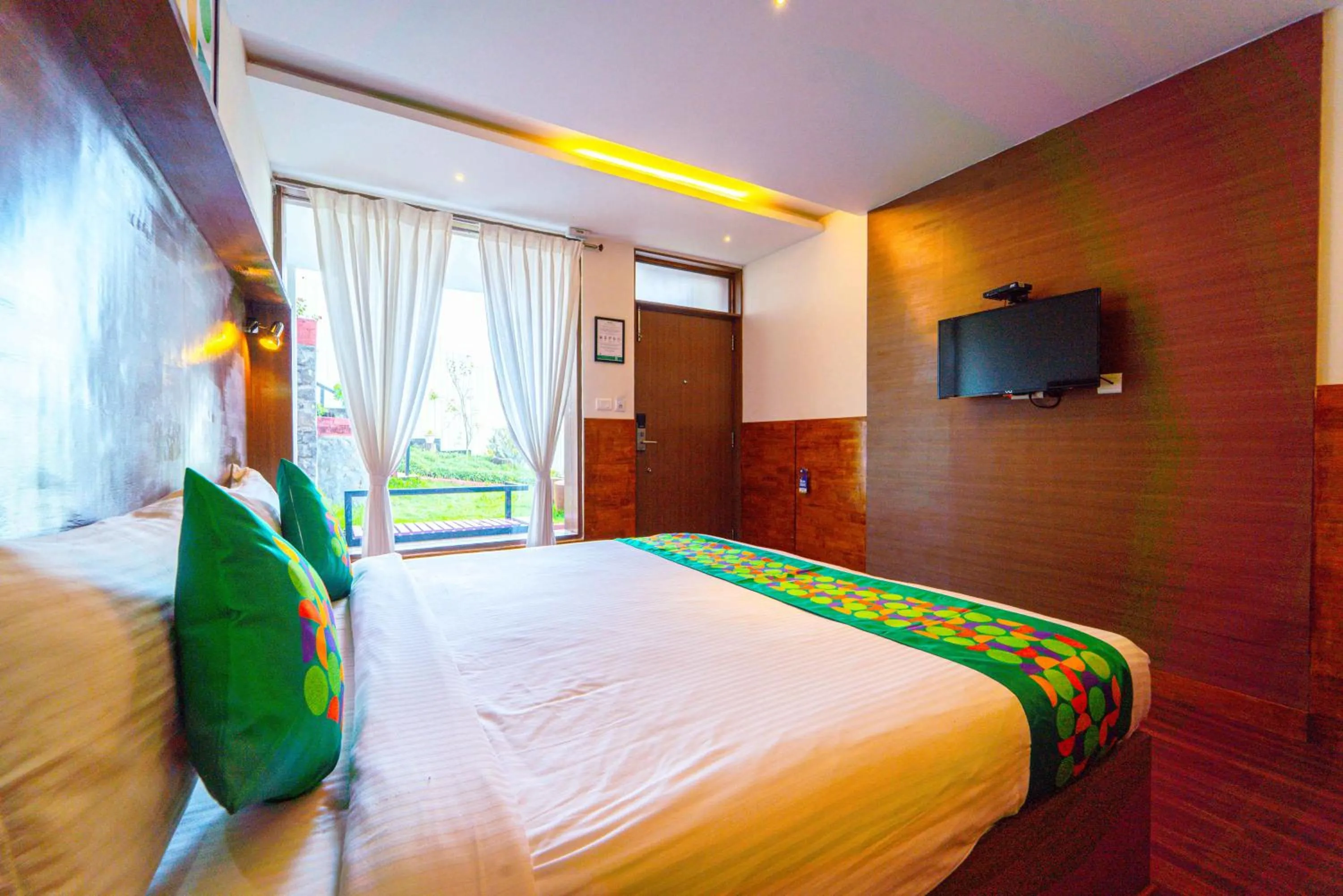 Bedroom, Bed in Treebo Tranquil Heights With Scenic View