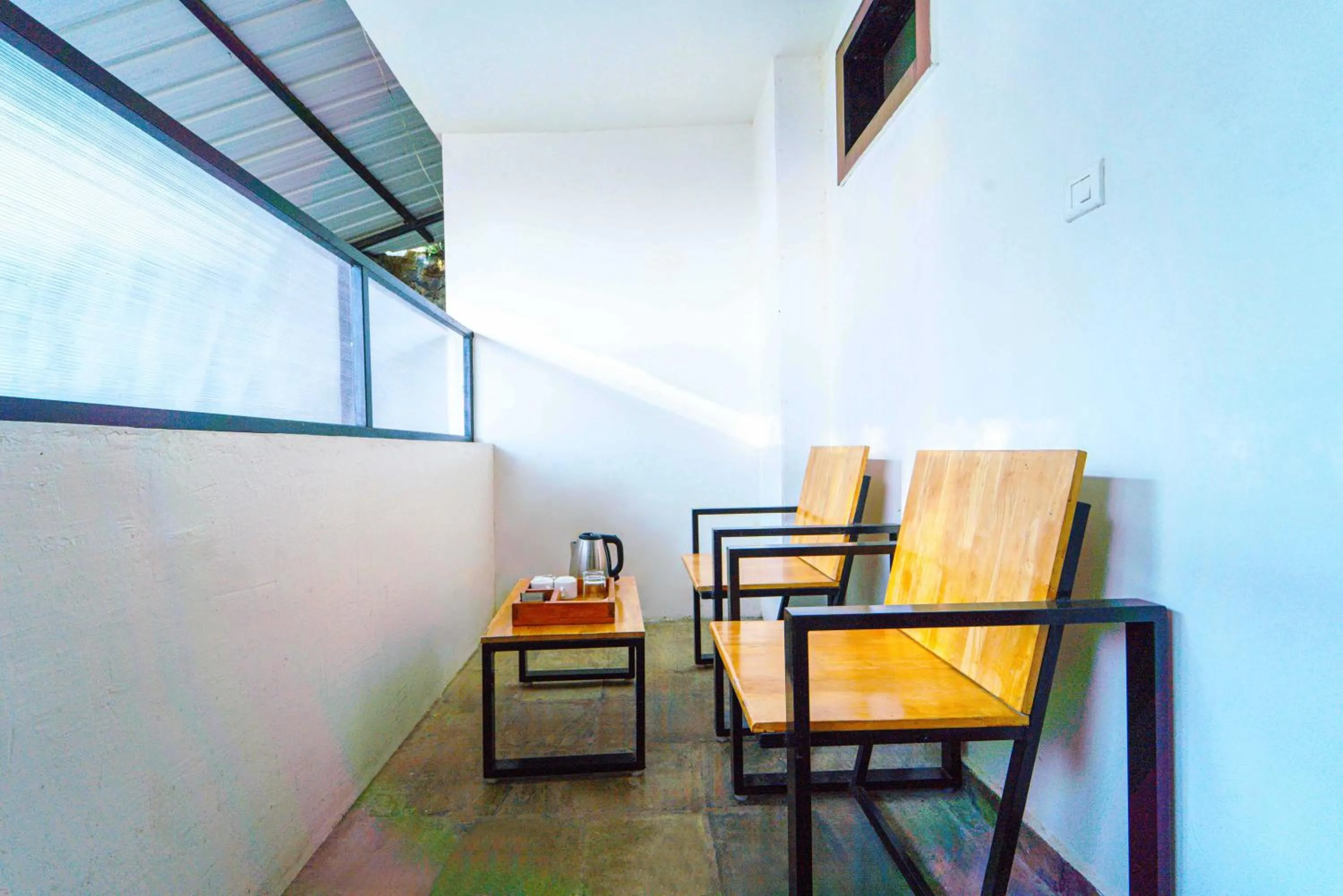 Seating area in Treebo Tranquil Heights With Scenic View