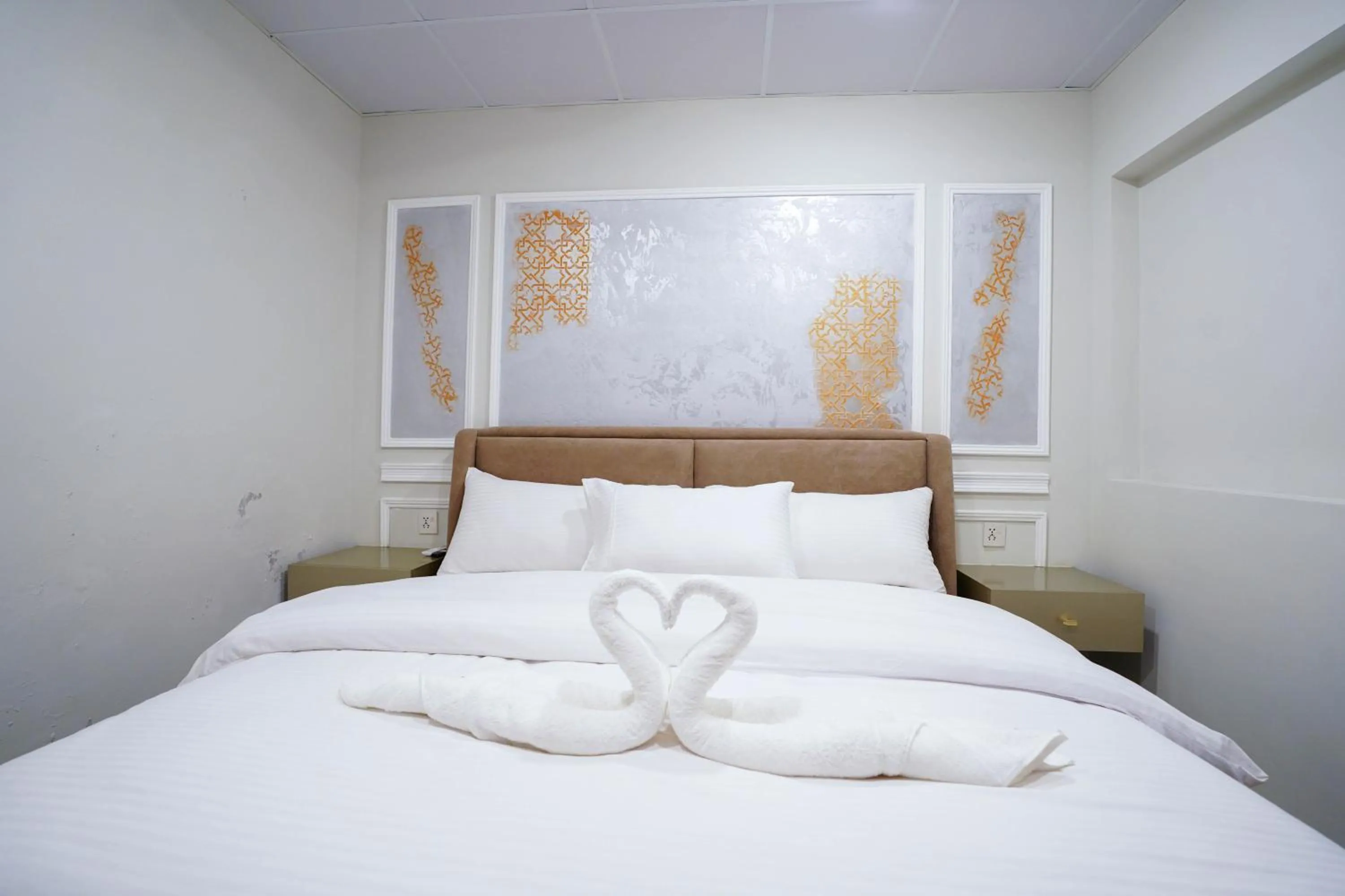 Bed in Luxvill Hotel