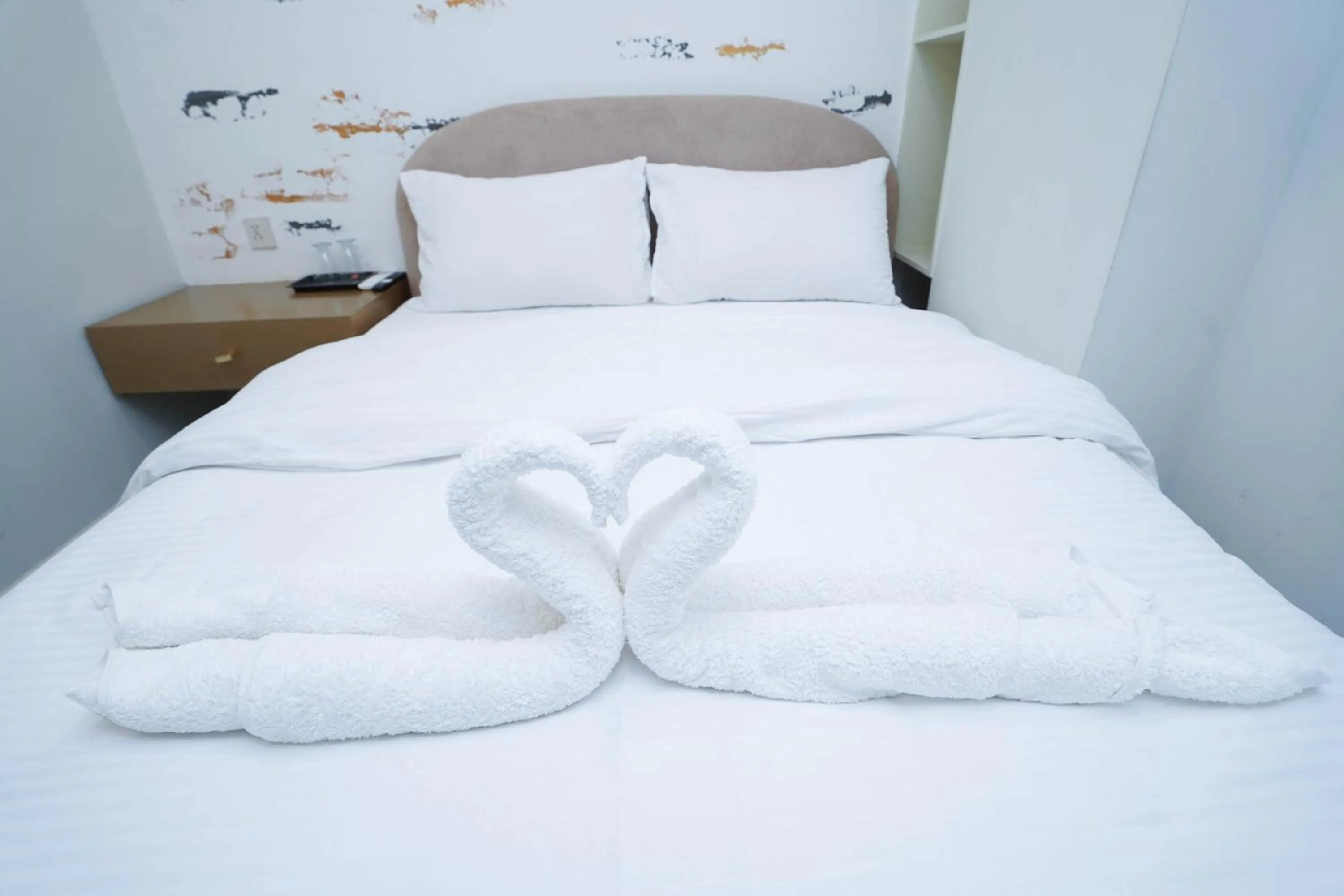 Bed in Luxvill Hotel