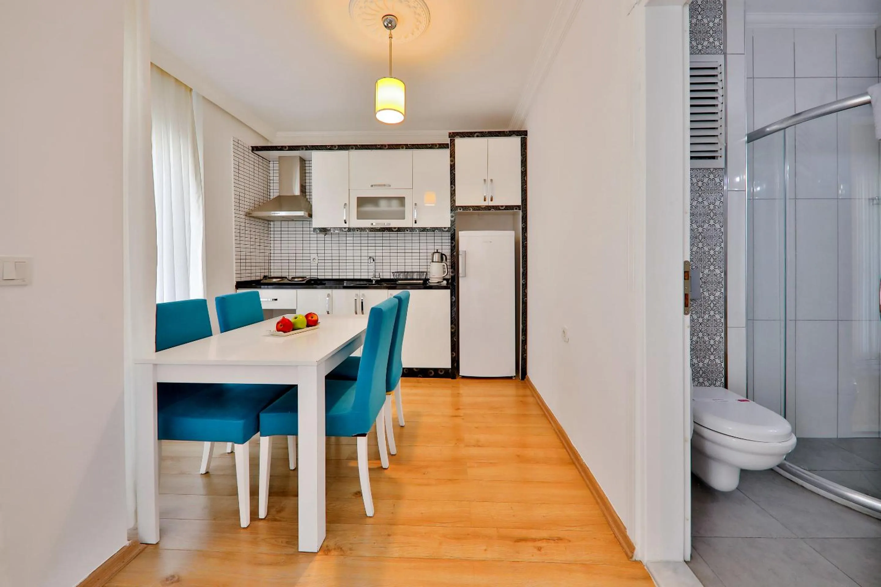 Kitchen or kitchenette in Bossa Nova Apart Hotel