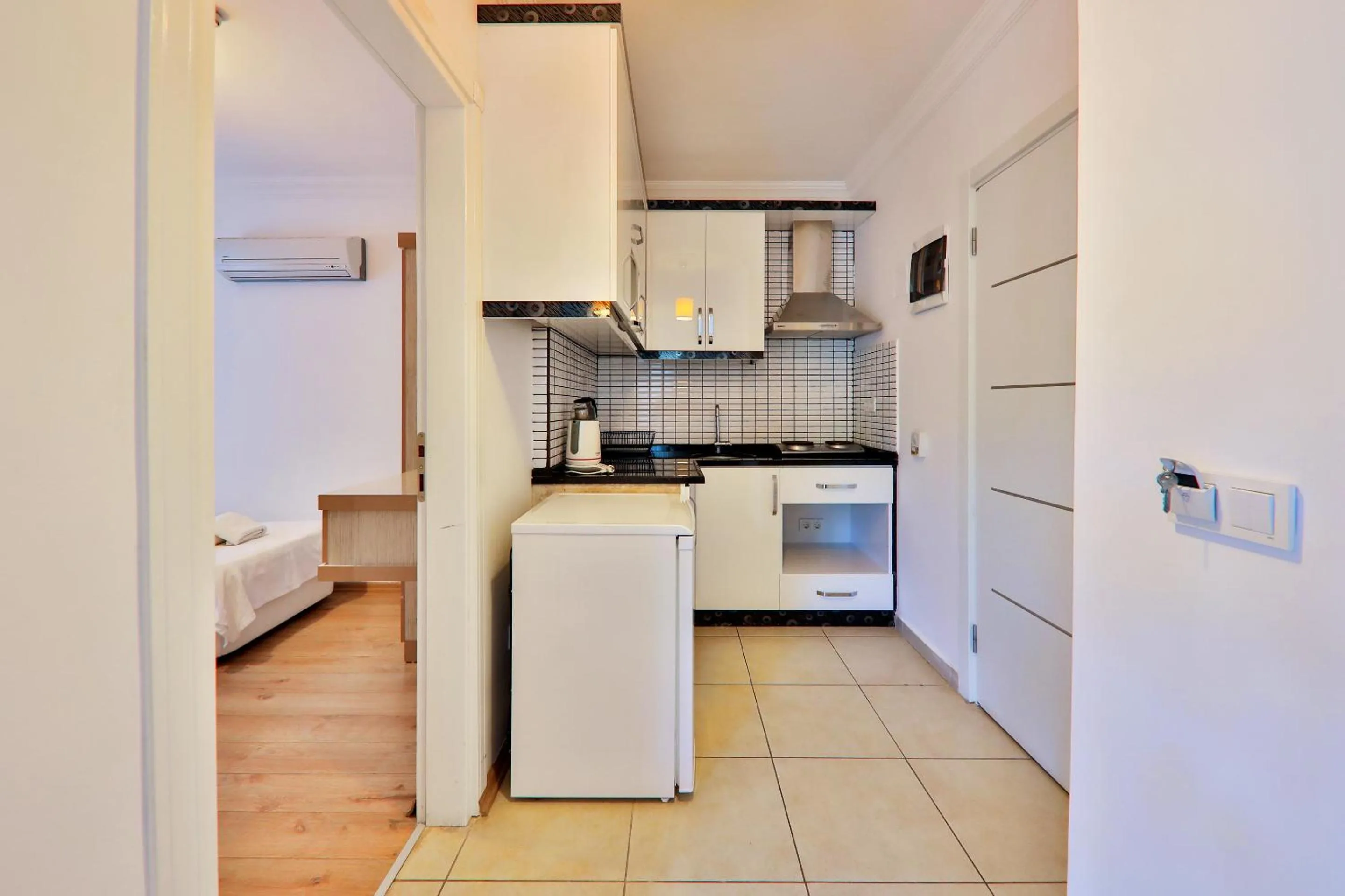 Kitchen or kitchenette in Bossa Nova Apart Hotel