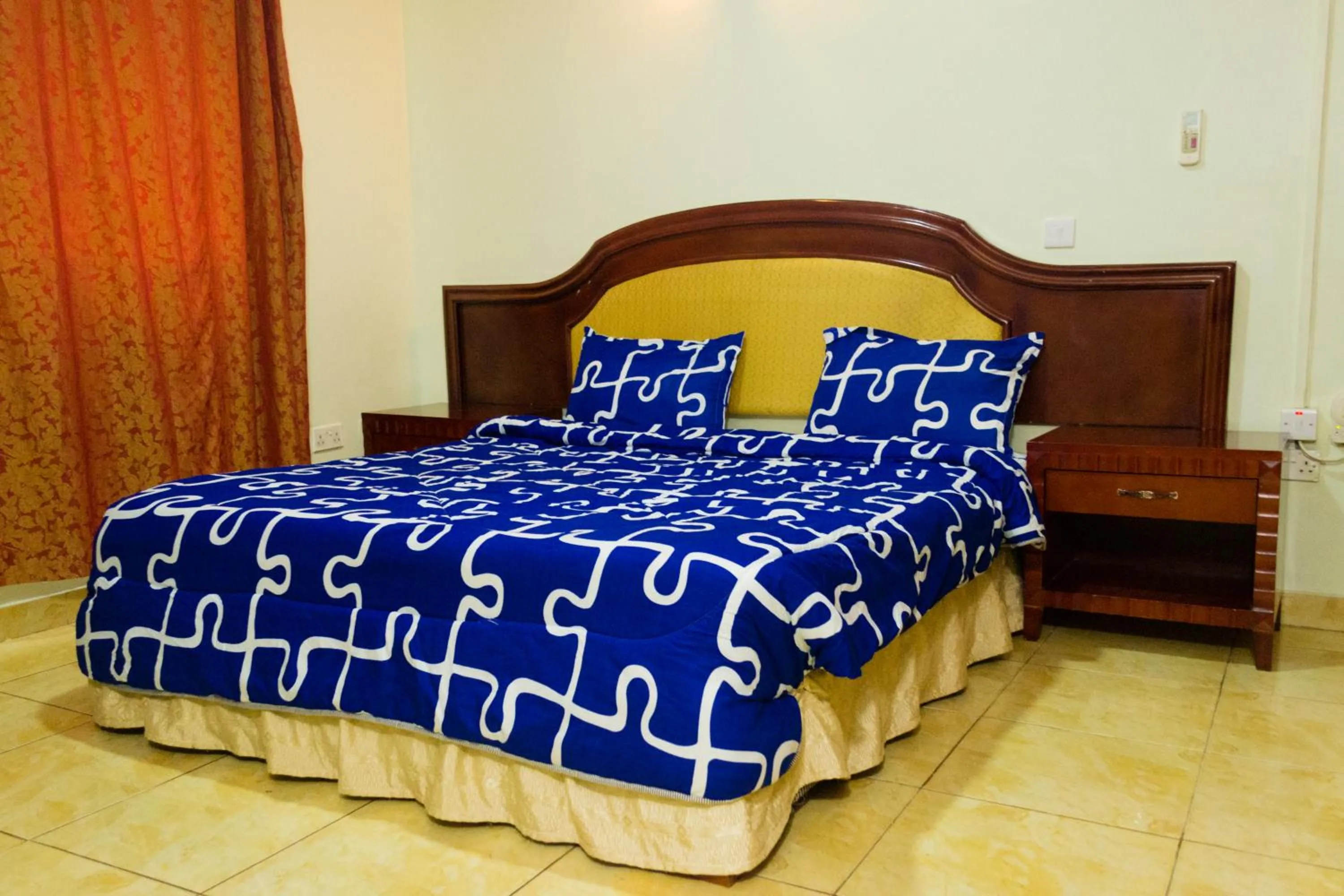 Bed in Emerald Hotel Kampala