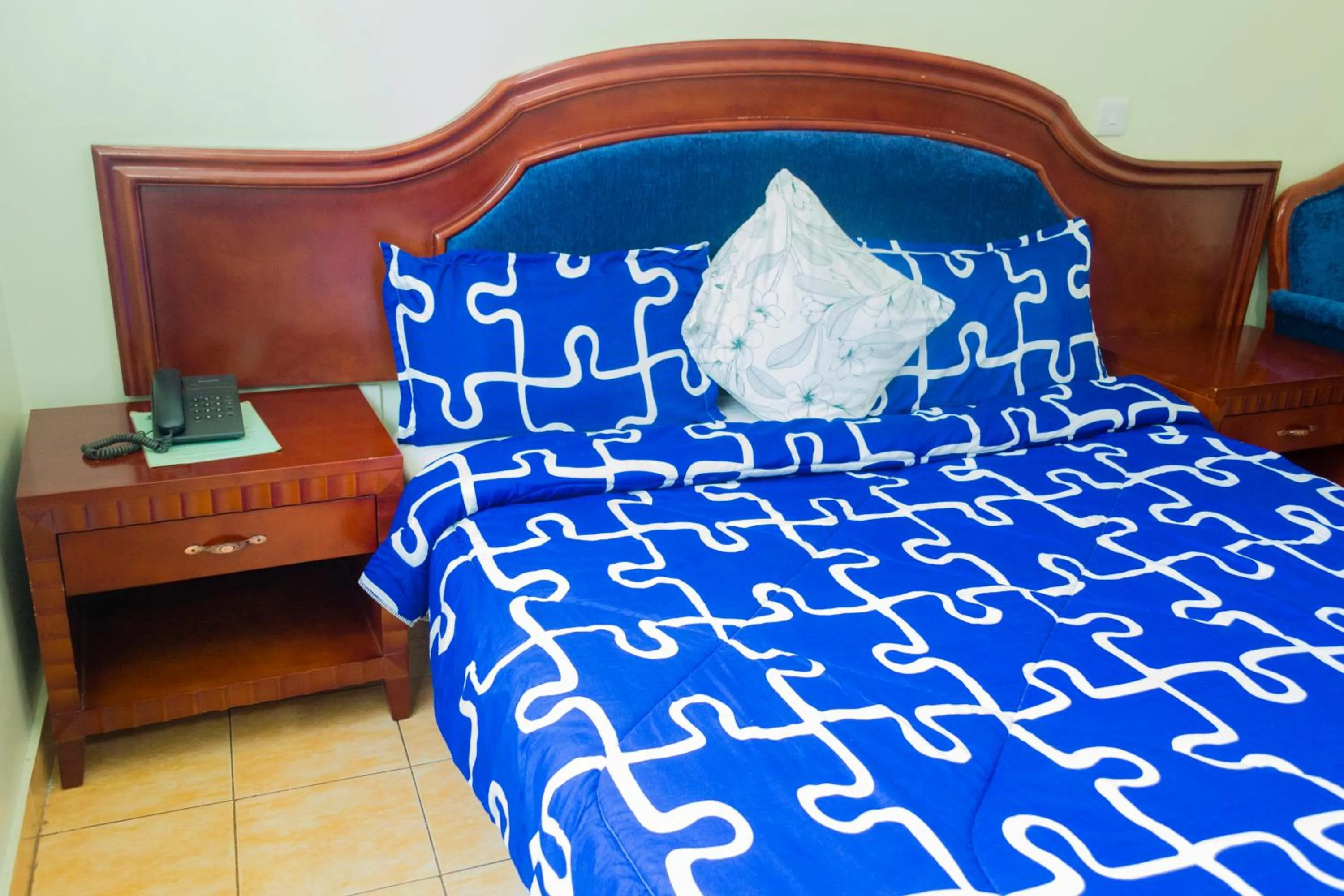 Bed in Emerald Hotel Kampala