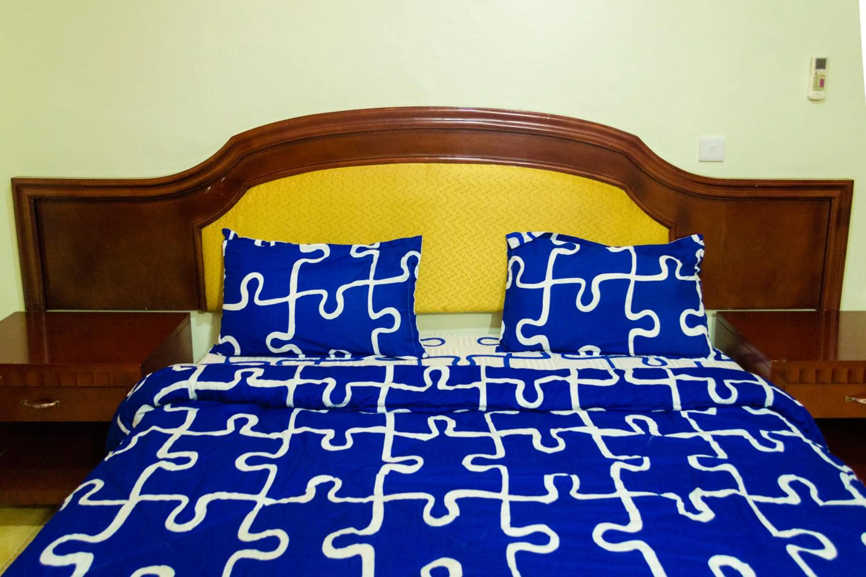 Bed in Emerald Hotel Kampala