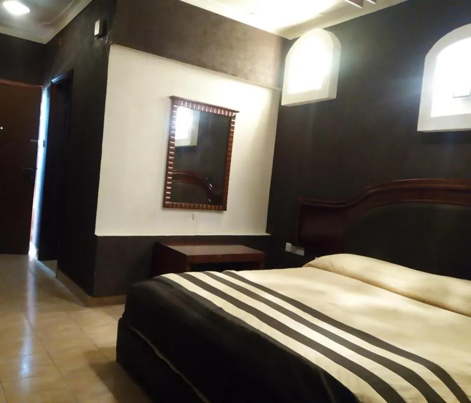 Bed in Emerald Hotel Kampala