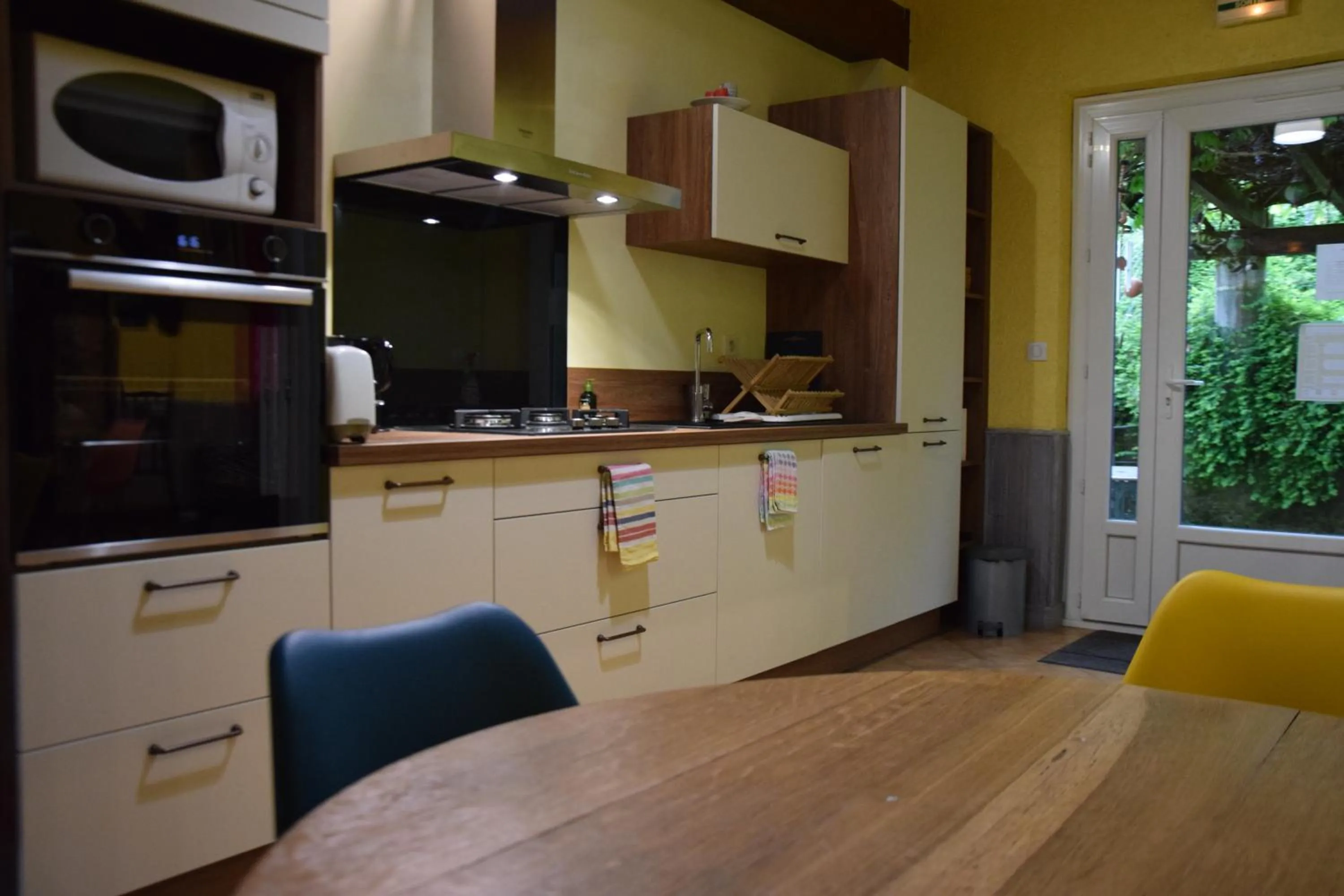 Communal kitchen in Chambres d'Hôtes L'Orée des Bois