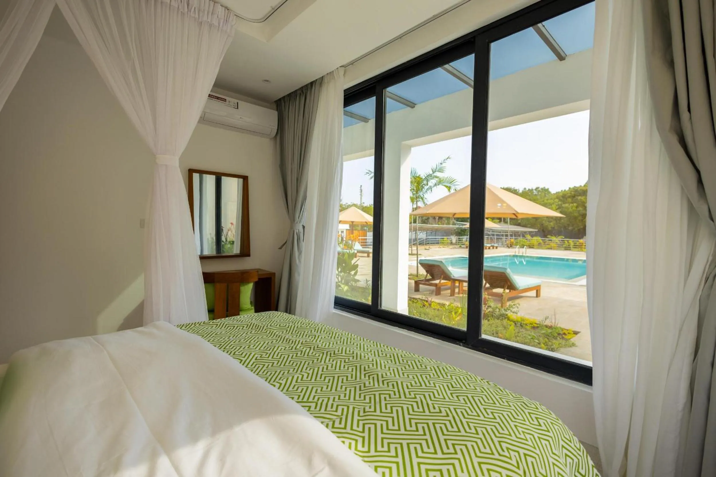 Photo of the whole room, Bed in Amkia Villas Diani