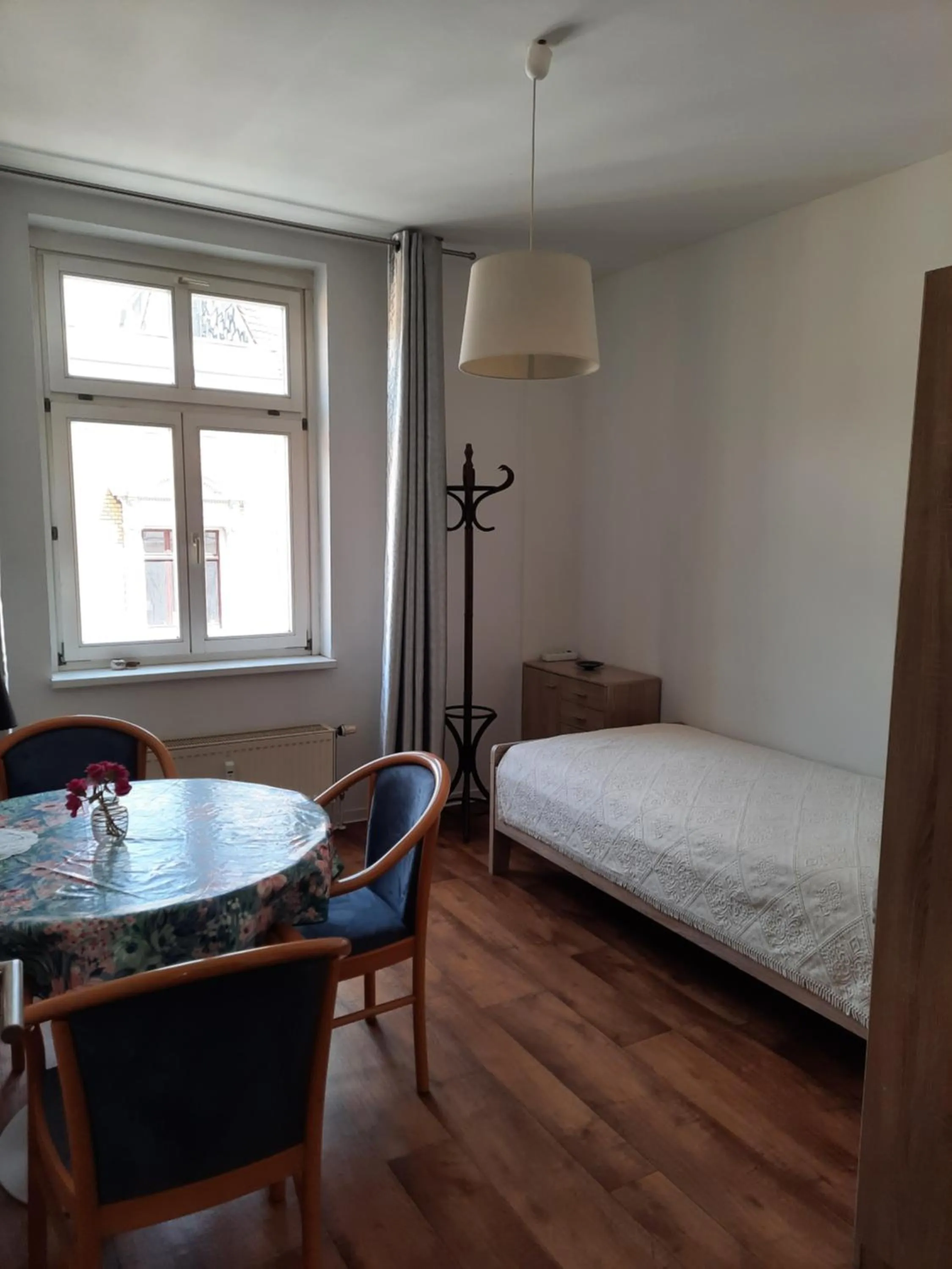 Living room, Bed in City Apartments Magdeburg