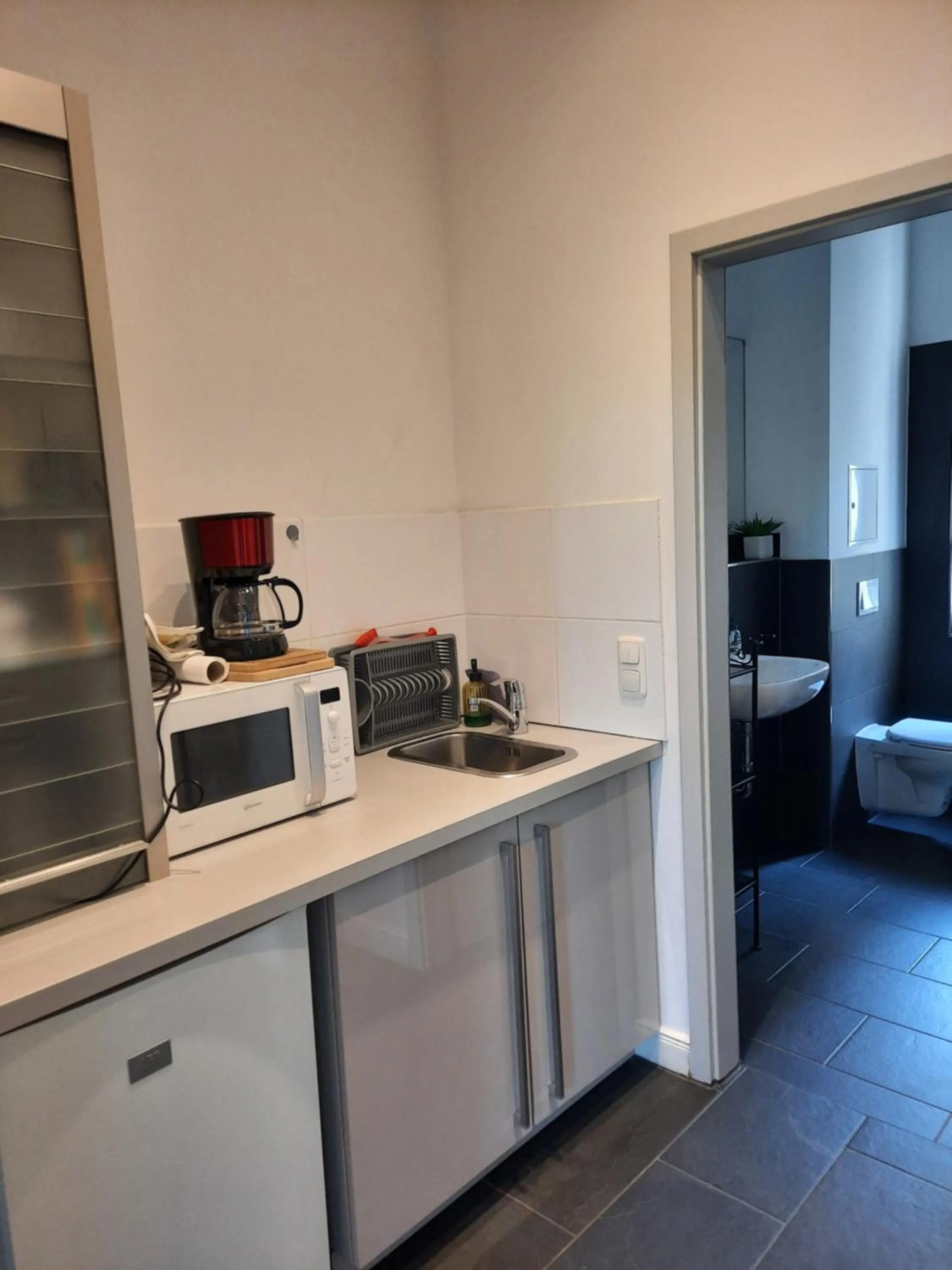 Kitchen or kitchenette in City Apartments Magdeburg