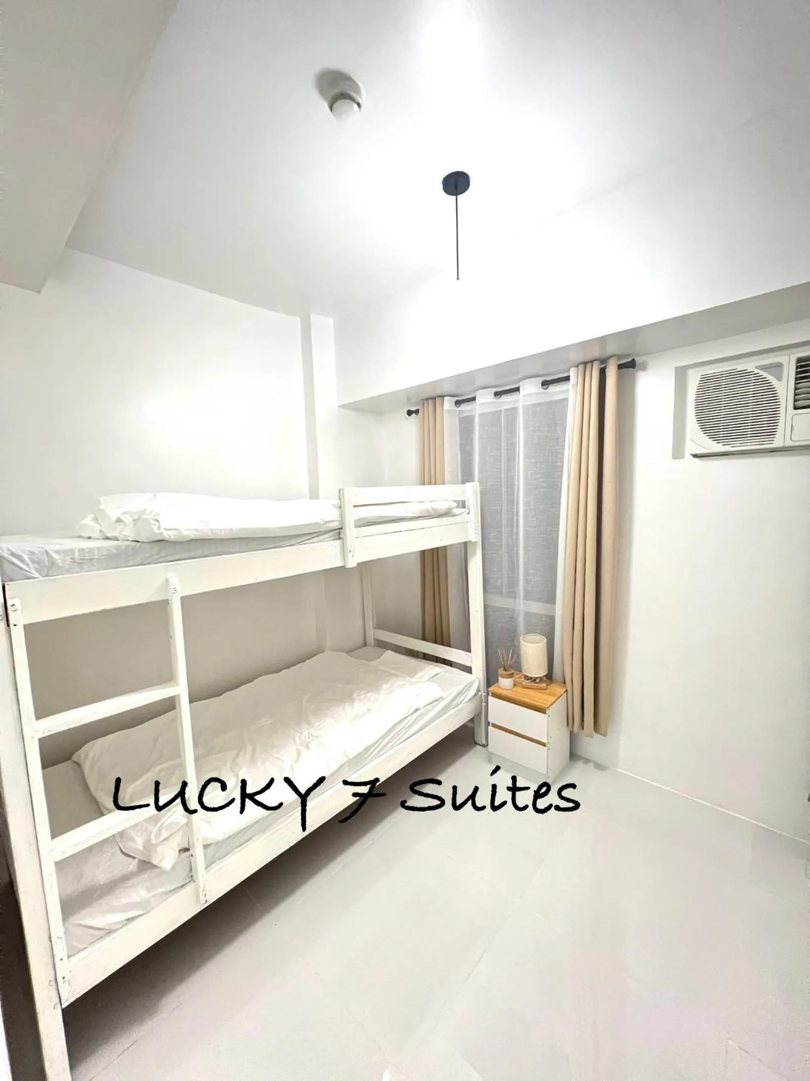 Bed in LUCKY 7 Suites